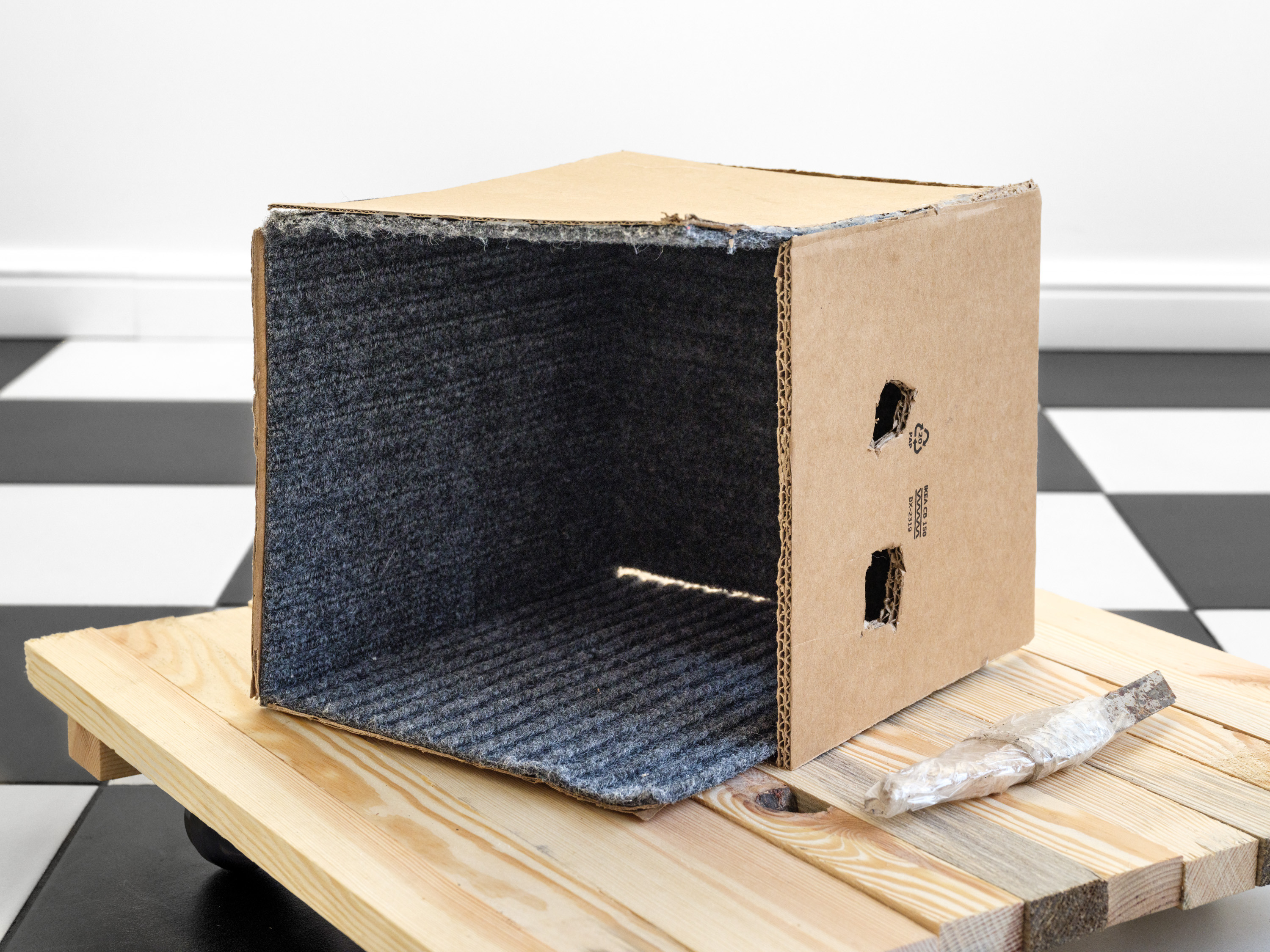 Tomek Paszkowicz, Triptych "Works I made by accident", 2024, wood, wheels, cardboard, carpet, glue, piece of europalets, tape, blade, 48x47x18cm