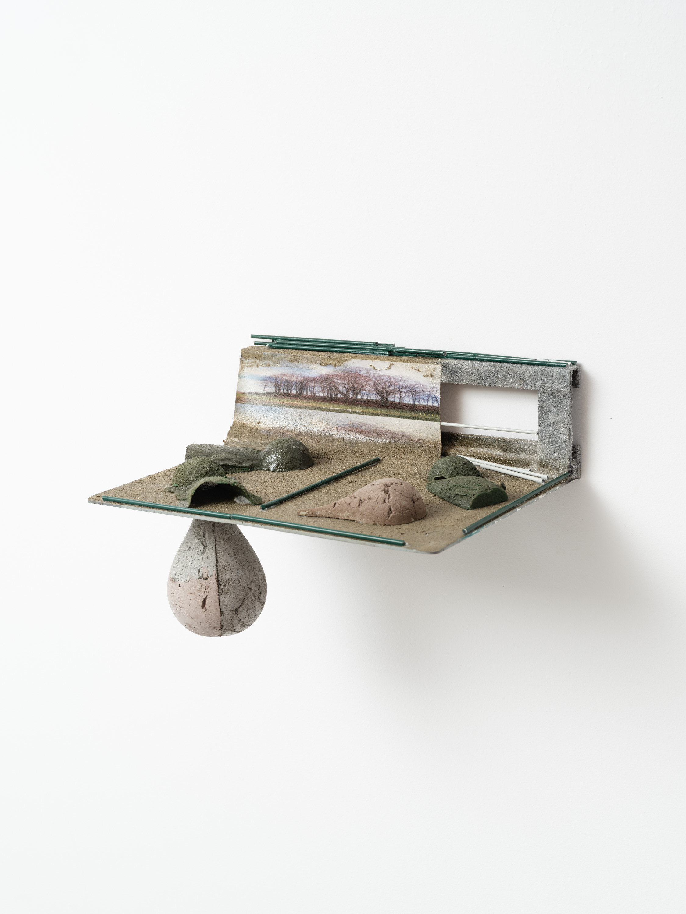 Piotr Kowalski "Horizon", 2024, steel, cement, flower foam, print on banner, 35x22x24 cm