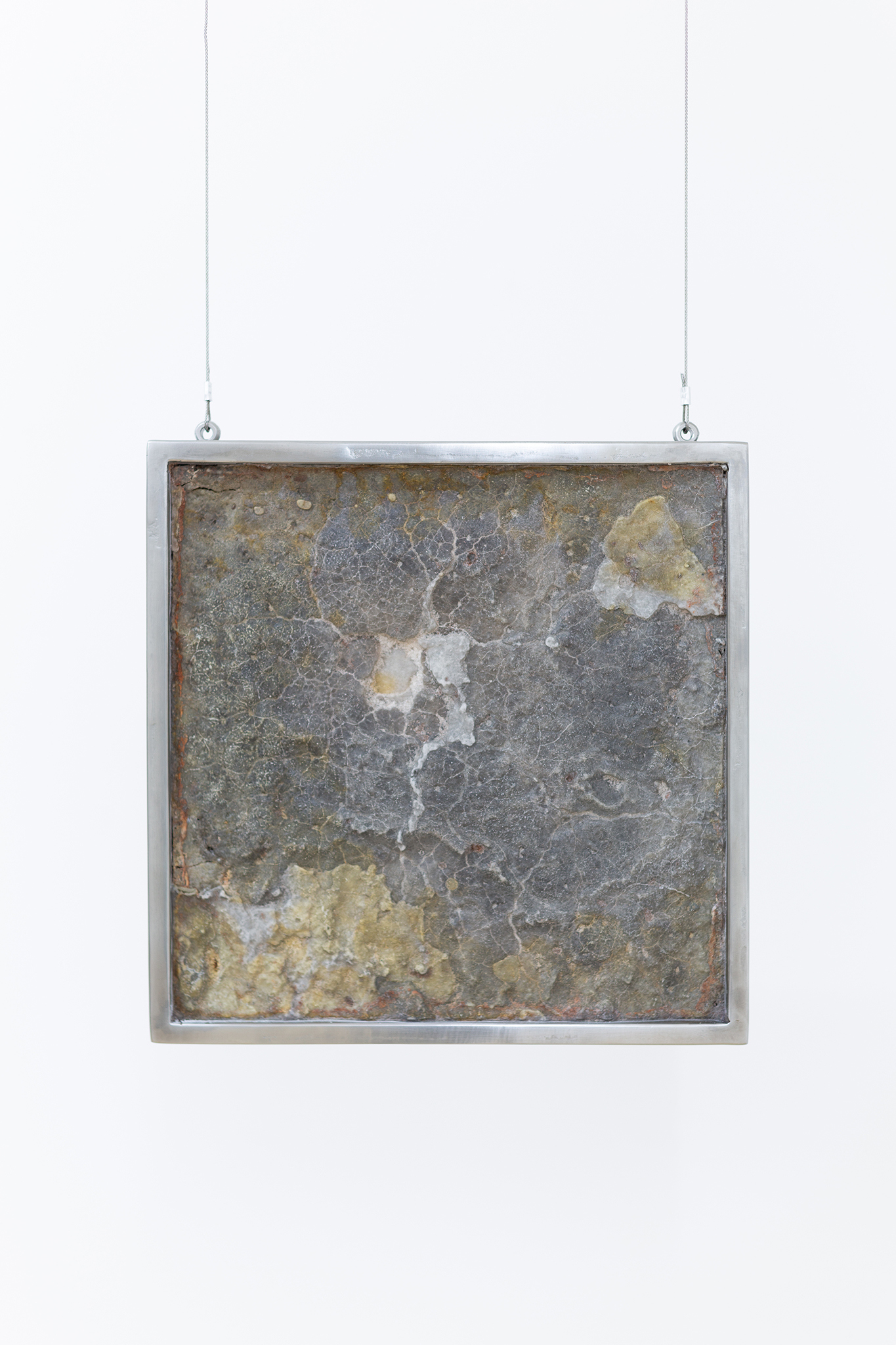 Sea of Tears, 2024. Stainless steel frame, salt from the Dead Sea engraved with tears, 30 x 30 cm