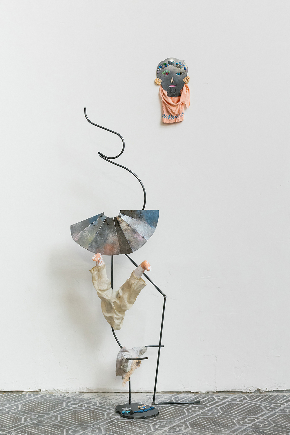 Lucia Leuci, Fornarina madre, 2024, Iron, resin, fabric, acrylic, alabaster powder, ash, eye shadow, blush, pigments, plastic, semi-precious stones, fossils, 163x60x38 cm