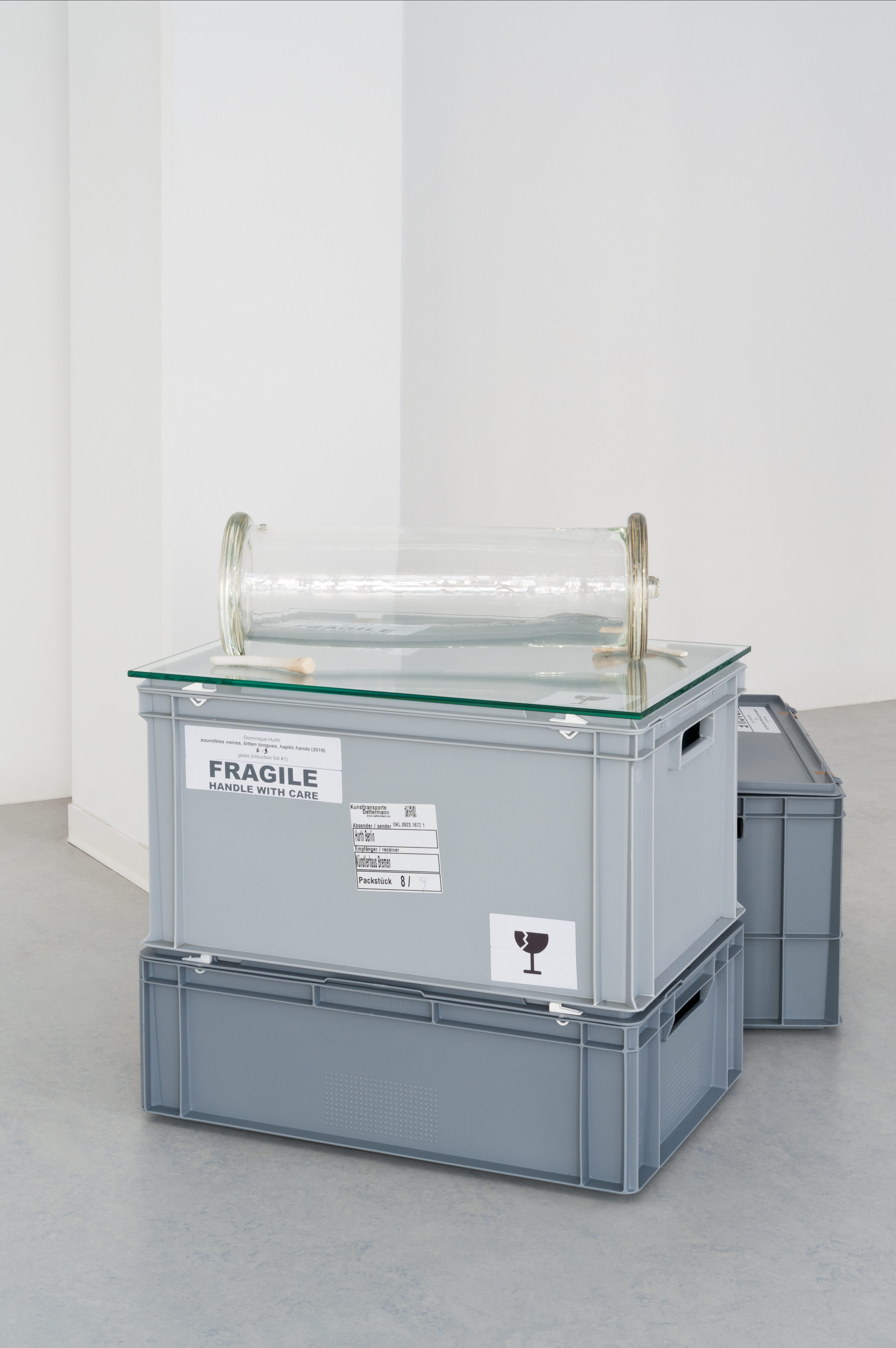 Dominique Hurth, soundless voices, bitten tongues, haptic hands, Blown glass, ceramics, glass, acrylic glass, acoustic foam, iron, 2019, exhibition view To want the world in a glass hat. at Neun Kelche, Copyright Dorothea Dittrich, VG Bildkunst 2024.