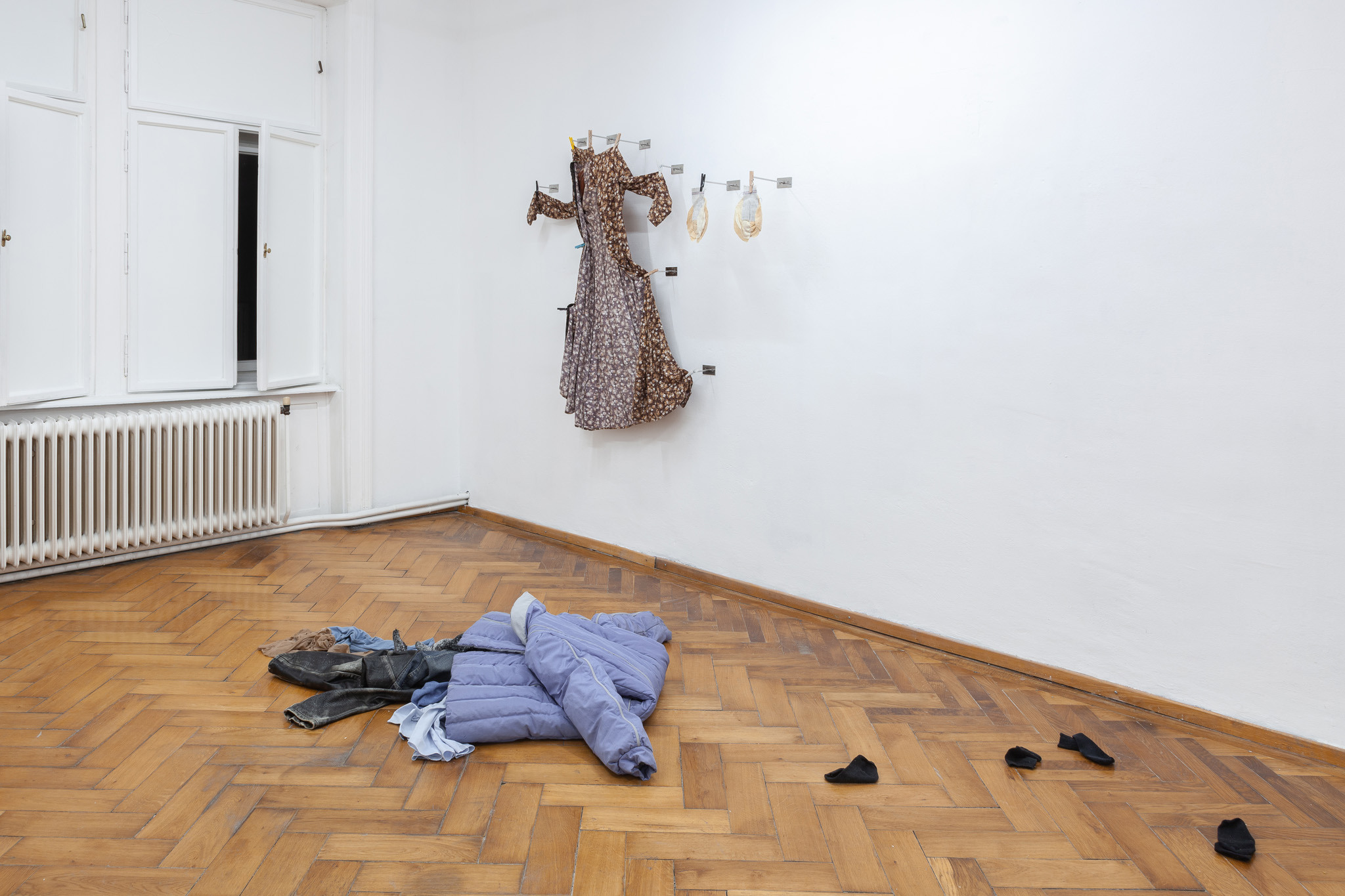 Hannah Heilmann, The other thing is clothes (TOTIC), 2024  Stainless steel, screws, clothes pins