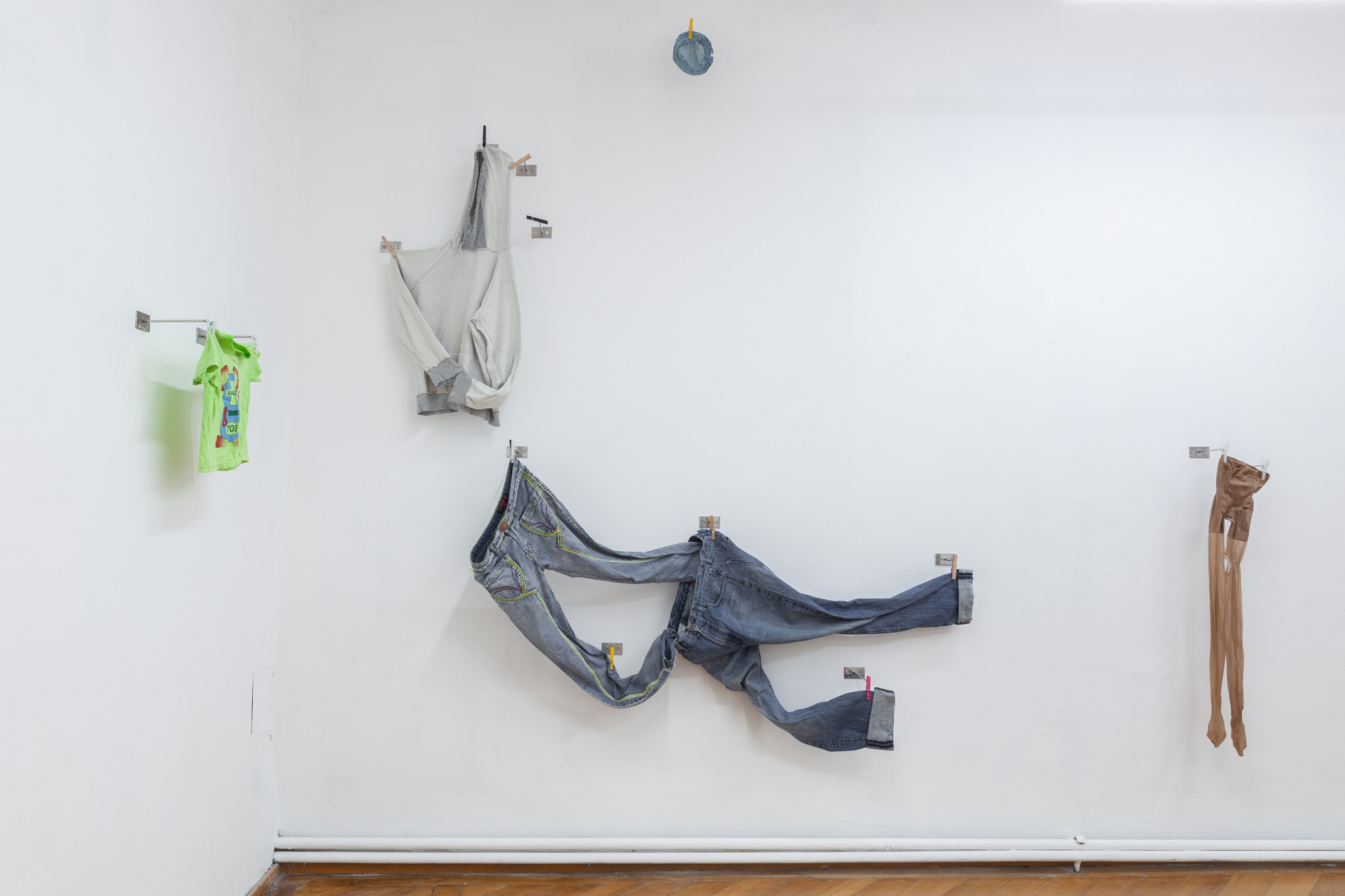 Hannah Heilmann, The other thing is clothes (TOTIC), 2024  Stainless steel, screws, clothes pins