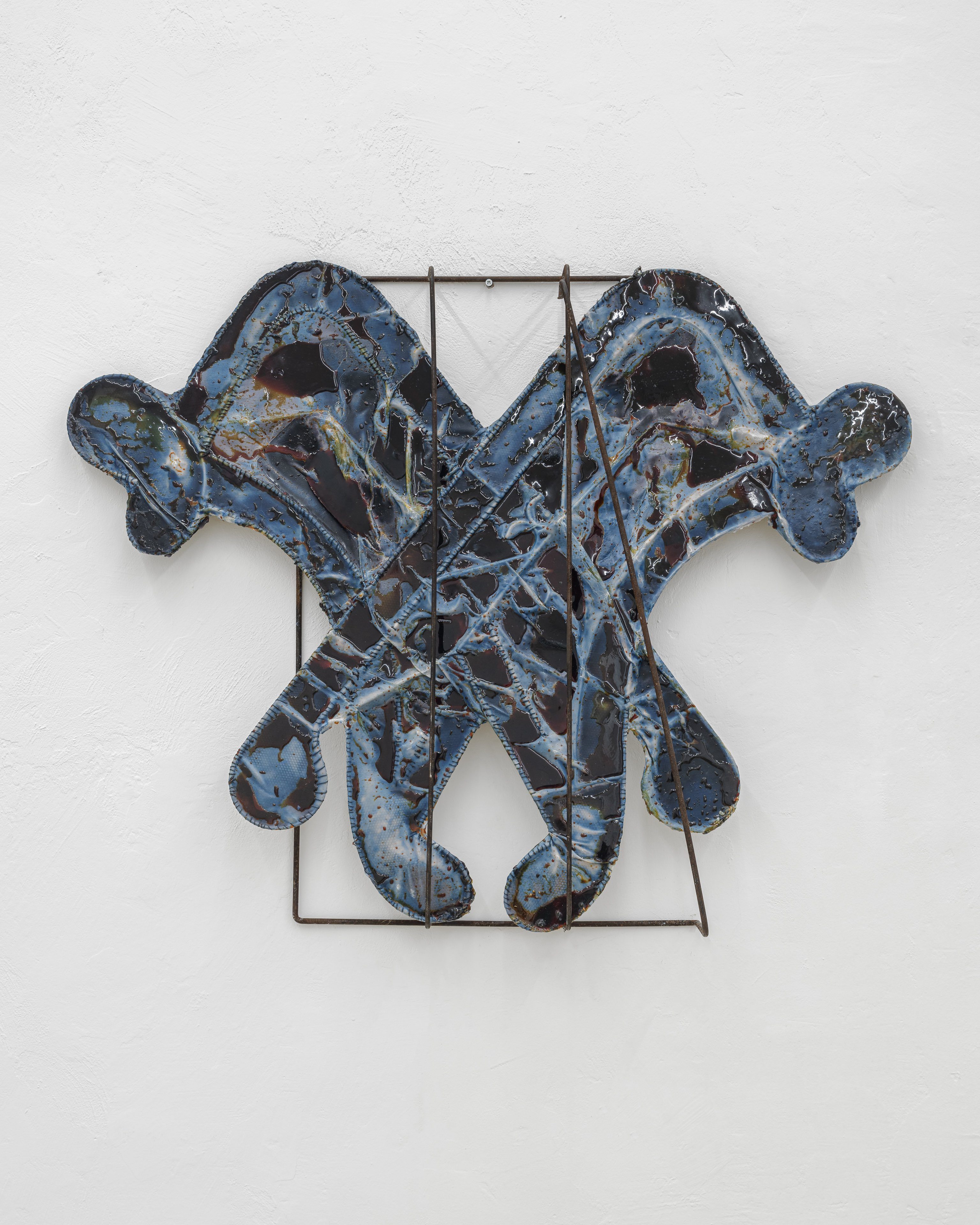 Bri Williams, Lethal, 2025 Bedsheet, resin, beeswax, indigo dye, thread, metal frame 145x110x19 cm, 57x43x7 in