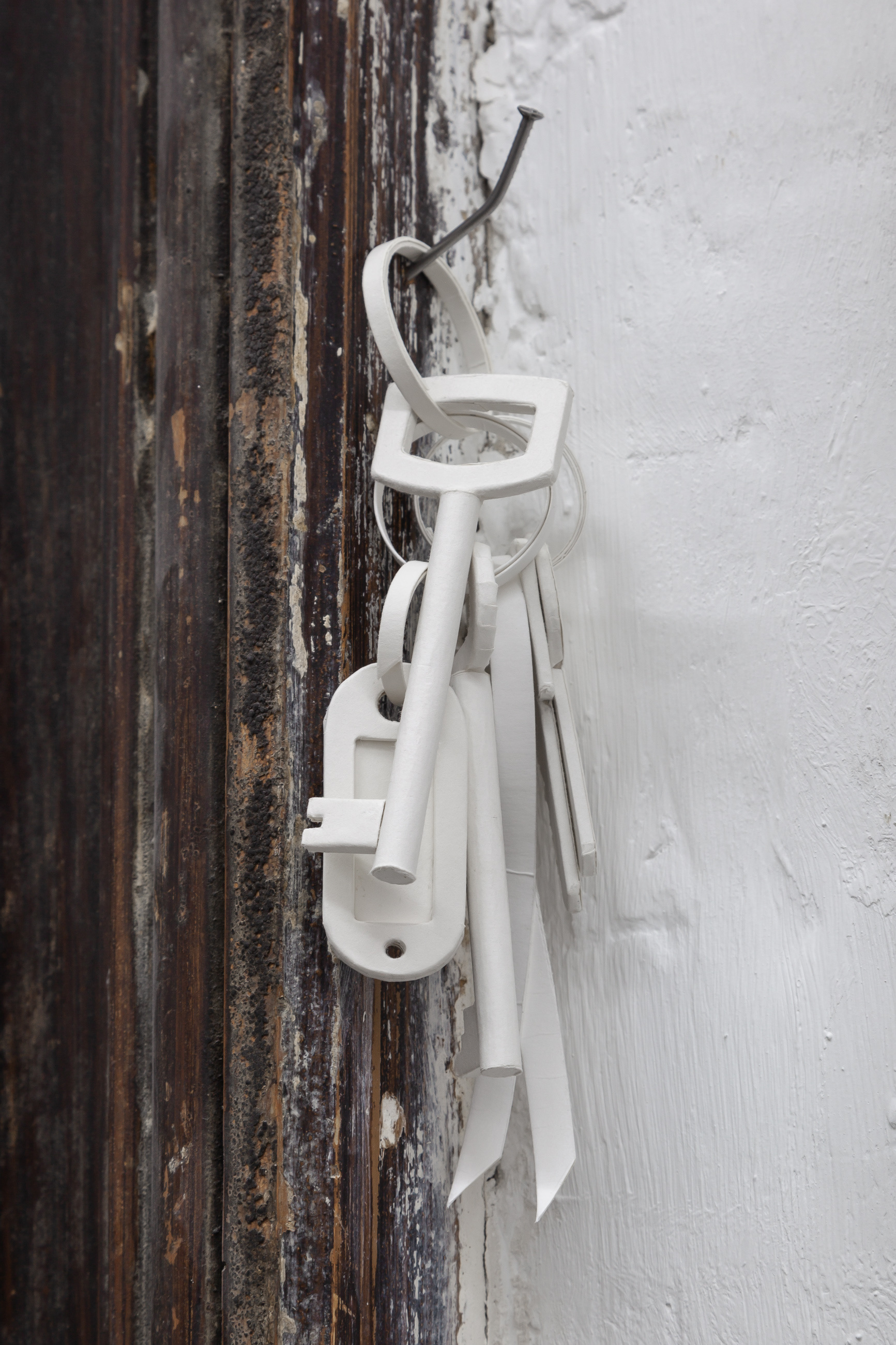 Lisa Sifkovits, Left behind artefact (keychain), 2025, Paper, variable dimensions