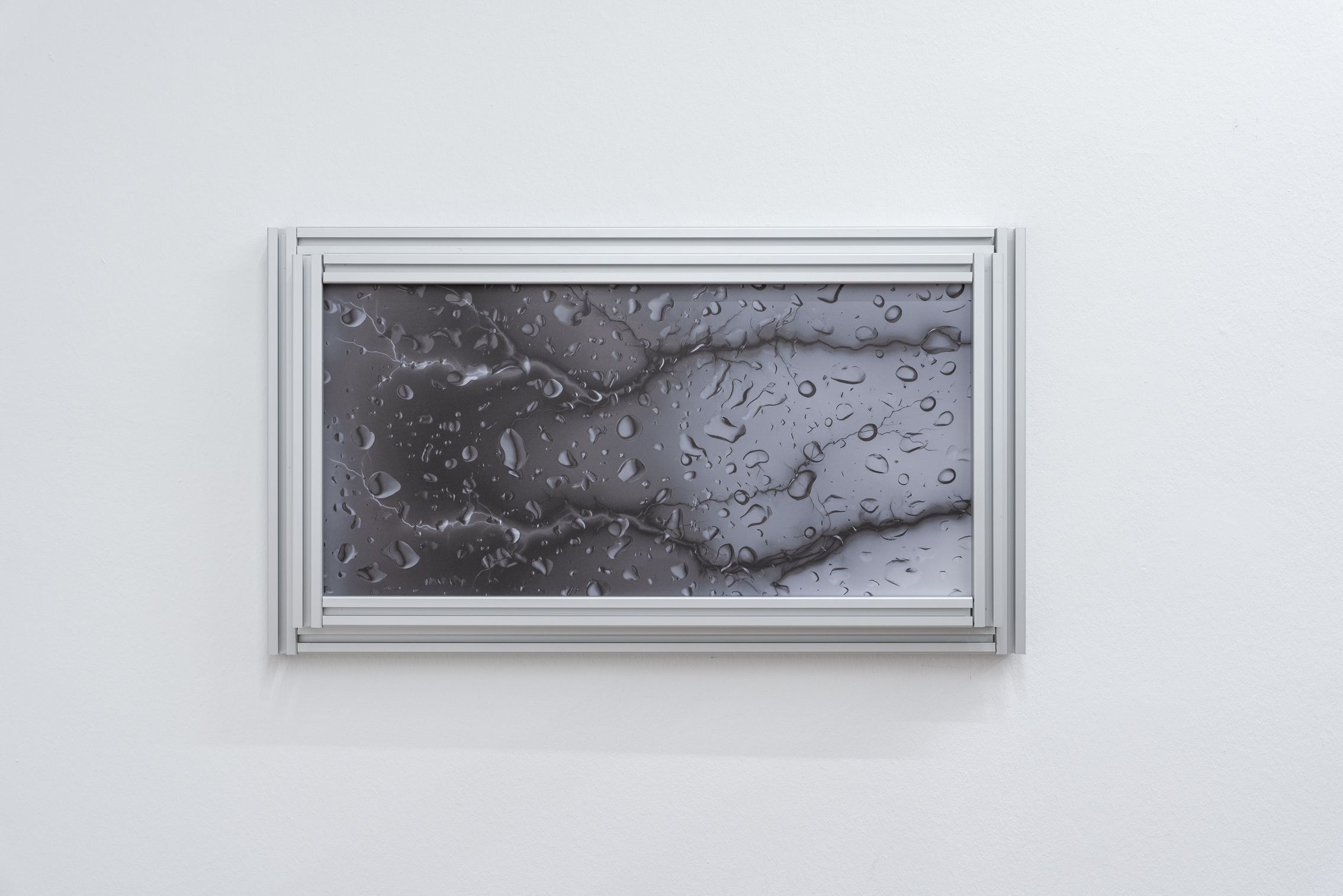 Tatjana Vall, "Don't Look Up", 2024, double layered UV print on aluminium, aluminium frame, 42 x 72 x 6 cm.