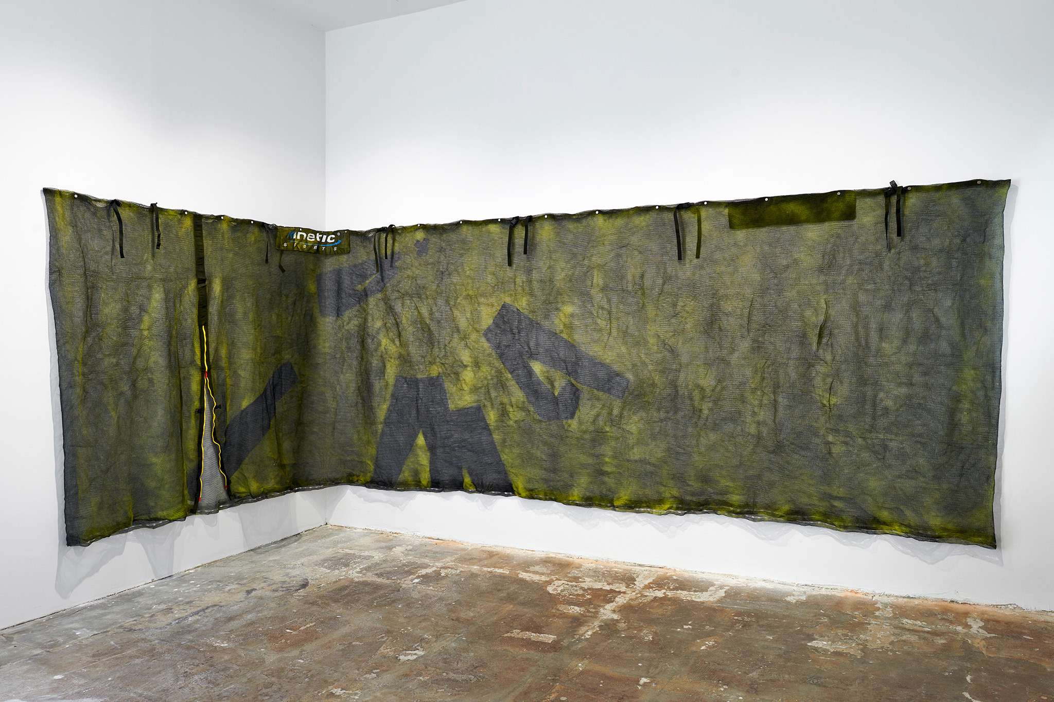 Hêlîn Alas - The word safe is never a verb, 2025, Safety net, lacquer, 180 x 565 cm