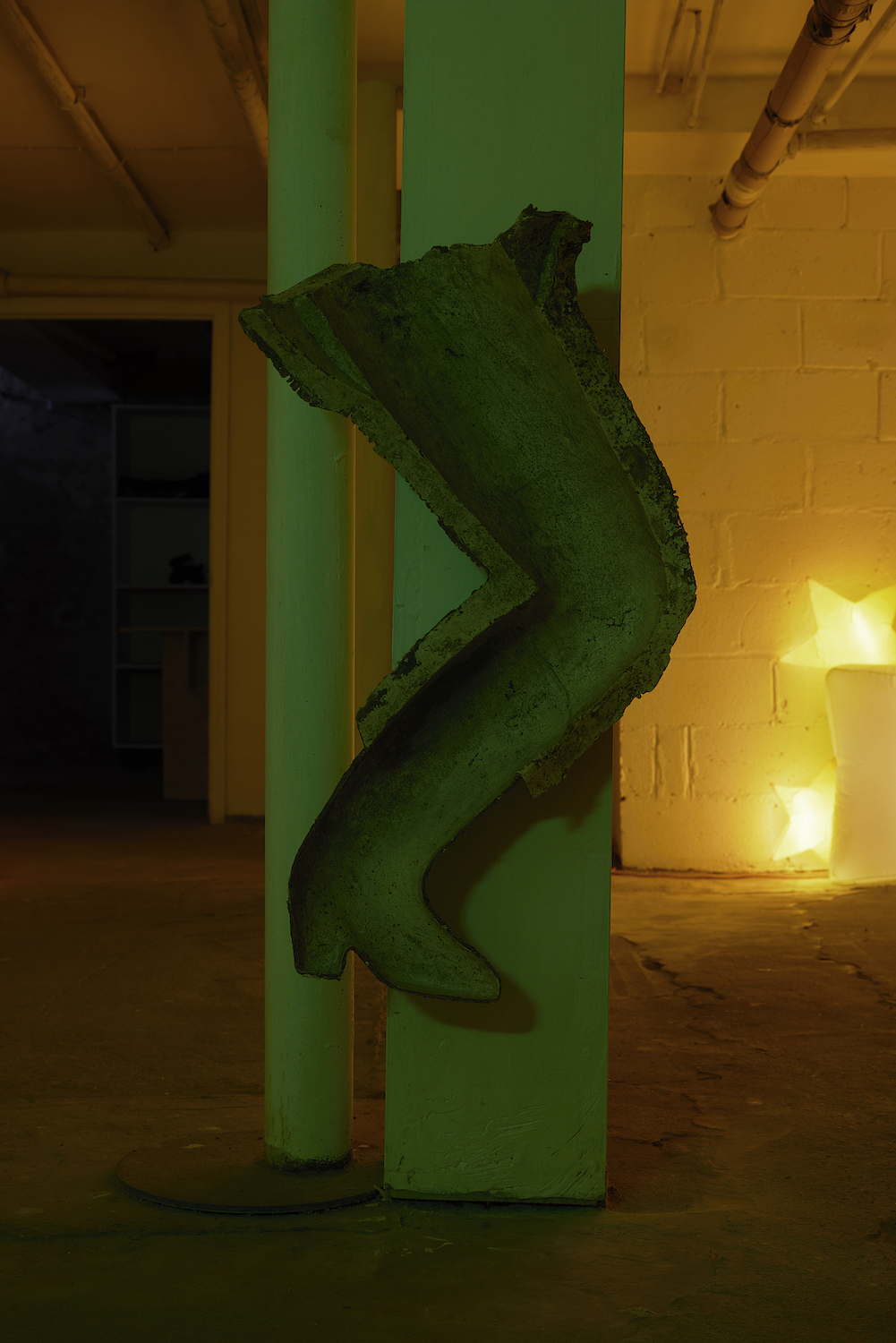 Jacob Jackmauh, âDriving,â 2025. Discarded factory mold, dirt, epoxy putty, hardware, 32 x 17 1â2 x 9 inches