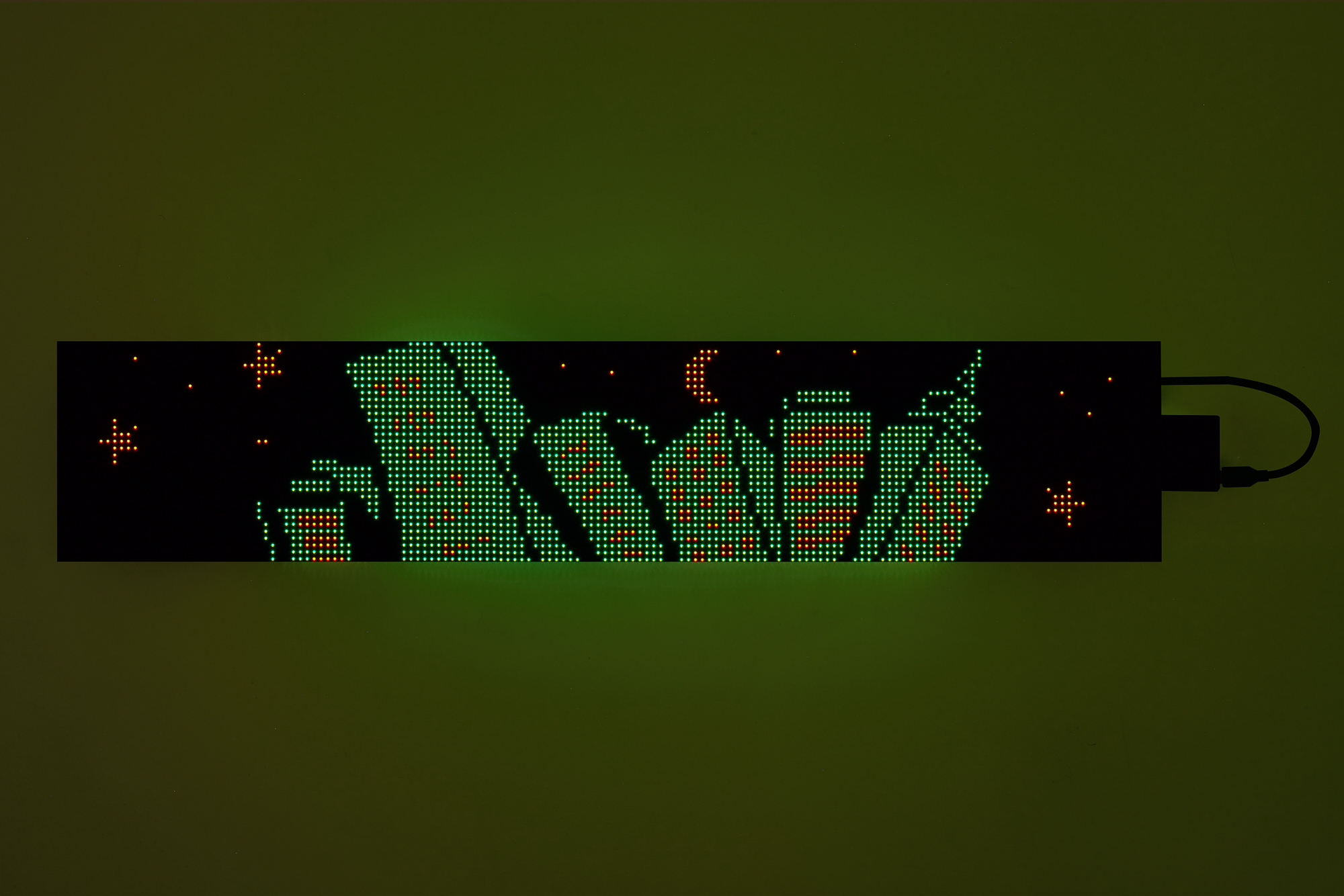 Jacob Jackmauh, âR143 Caesura,â 2025. LED matrix panel, 5 x 29 inches