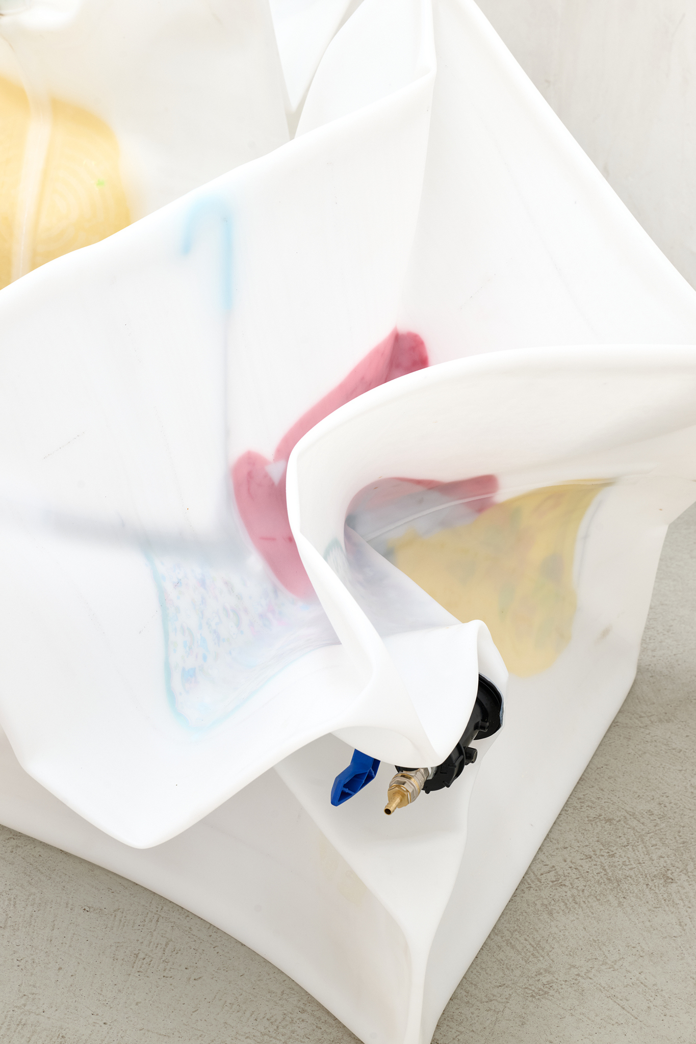 Sacha Kanah, Jelly Roll Gum Drop, 2025, IBC, valve, inflatable pool, umbrella, acrylic, vacuum, 109 x 123 x 112 cm