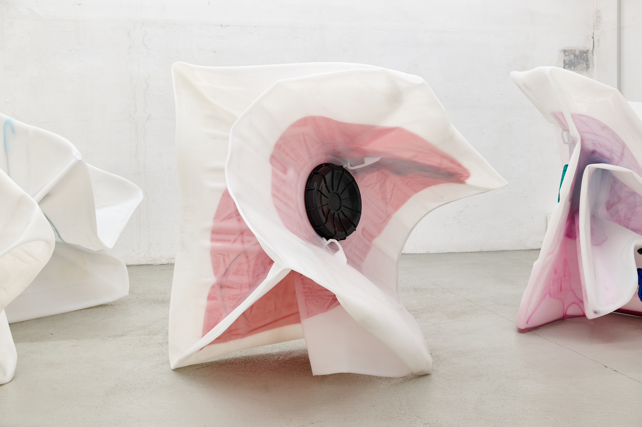 Sacha Kanah, A Little Green Rosetta, 2025, IBC, valve, inflatable sofa, steel rod, bleach, vacuum, 111 x 121 x 104 cm