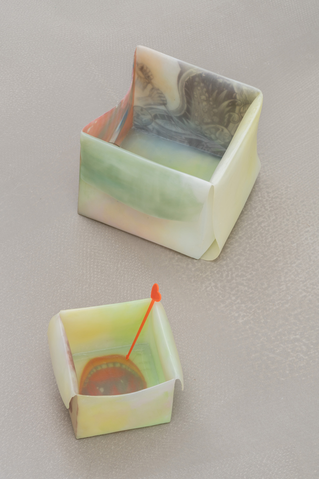 n, 2025 - inkjet print transfers on white glue, epoxy resin, anti-UV varnish, found objects, 17 x 23 x 21 cm