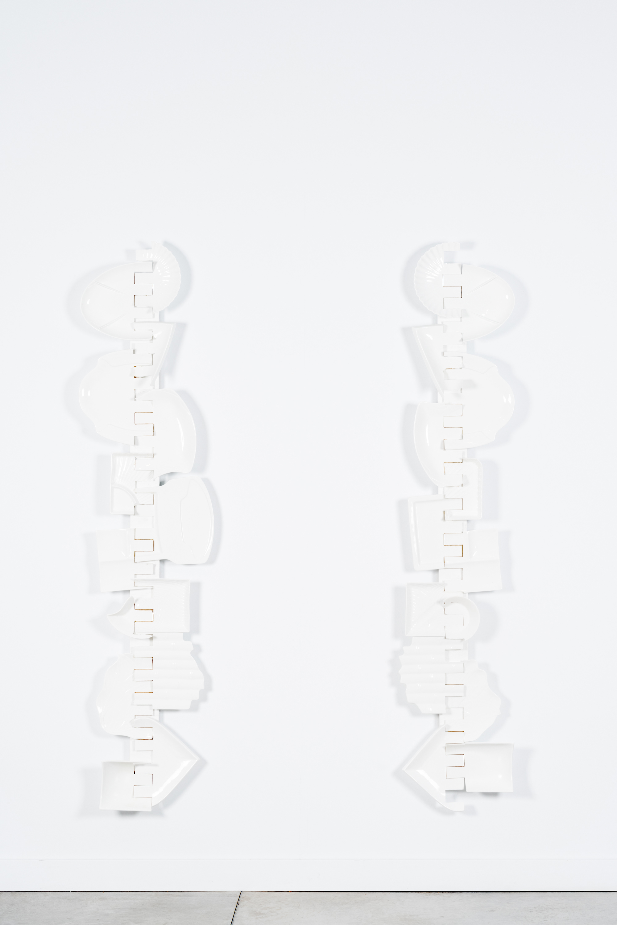 Javier Carro Temboury, Intercontainers (Ossatura: 2 China figures), 2024, Second-hand ceramics, industrial cut. 190 x 40 x 16  each.