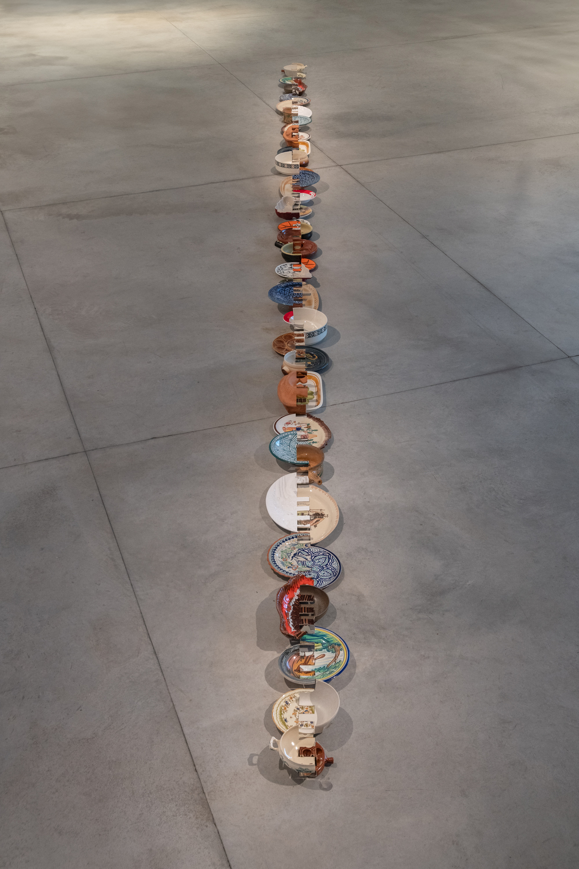 Javier Carro Temboury, Intercontainers, 2022, Second-hand ceramics, industrial cut. 1020 x 40 x 18 cm