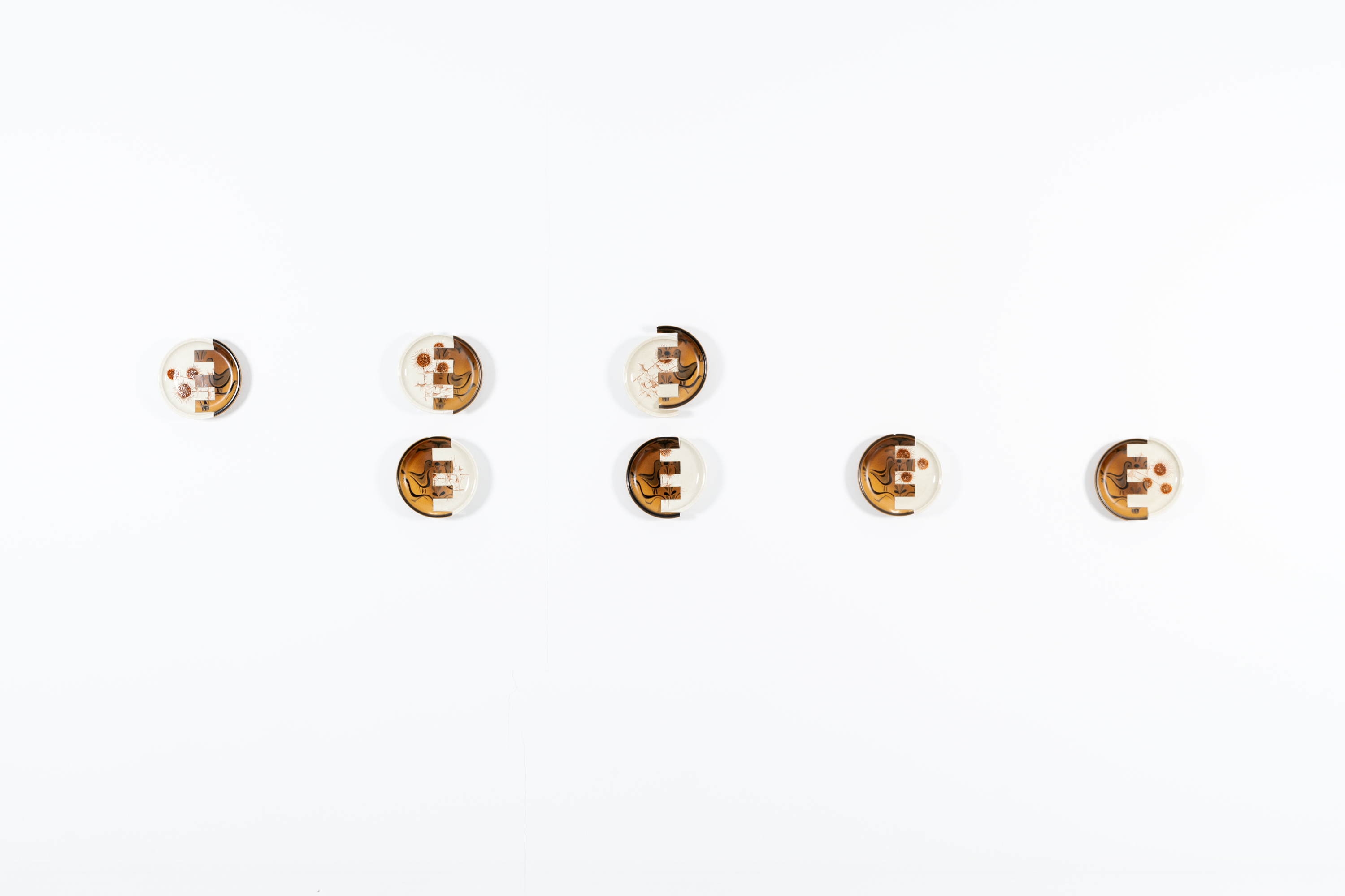 Javier Carro Temboury, Intercontainers (Sarreguemines: Chardons et Tourtereaux), 2024, Second-hand ceramics, industrial cut. 26 x 25 x 5 cm each.