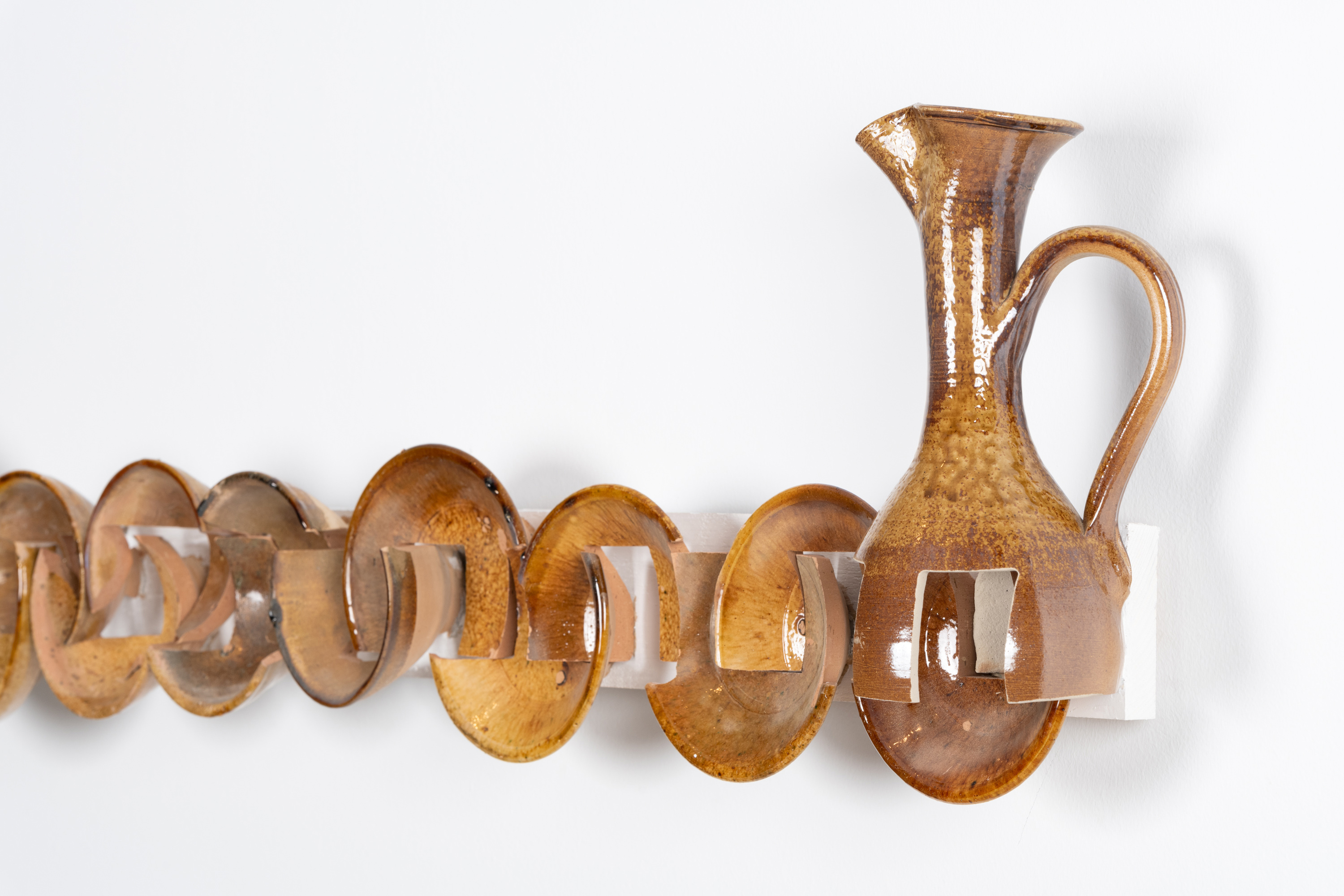 Javier Carro Temboury, Intercontainers (Maghreb, Modulor), 2024, Second-hand ceramics from Tamegroute, industrial cut. 250 x 40 x 12 cm.