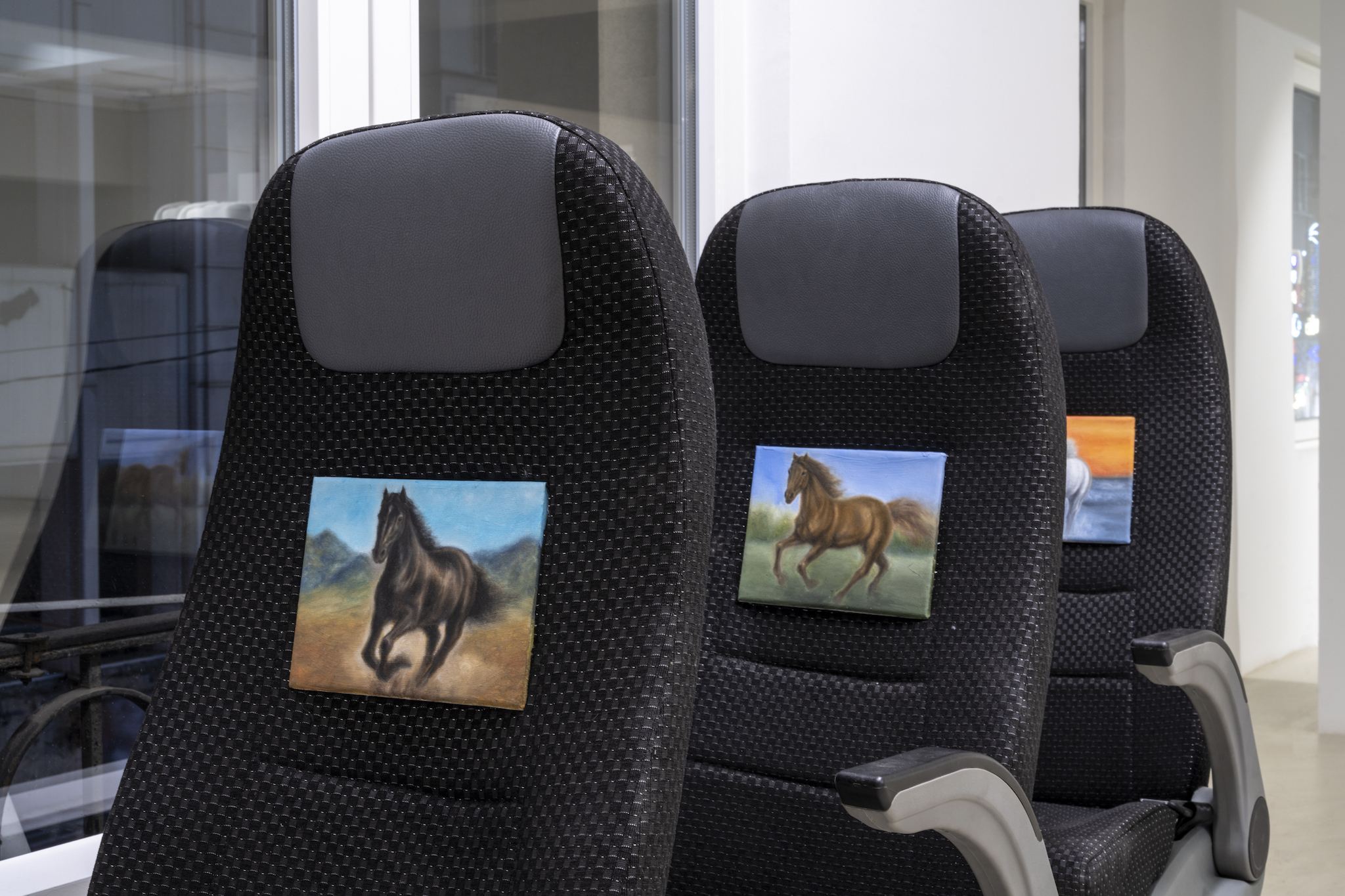 hope we’re not there yet, 2024, bus seats, oil painting on canvas, 3d print spider (pla), 22-year-old spiderman toy