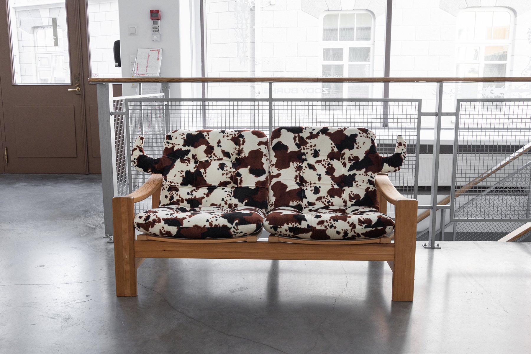 Cowch. Cow print fabric, tanned cow tail, Yngve Ekström sofa. 1.36 x 1.4 x .72 m 2025. Photo: Jane Treima
