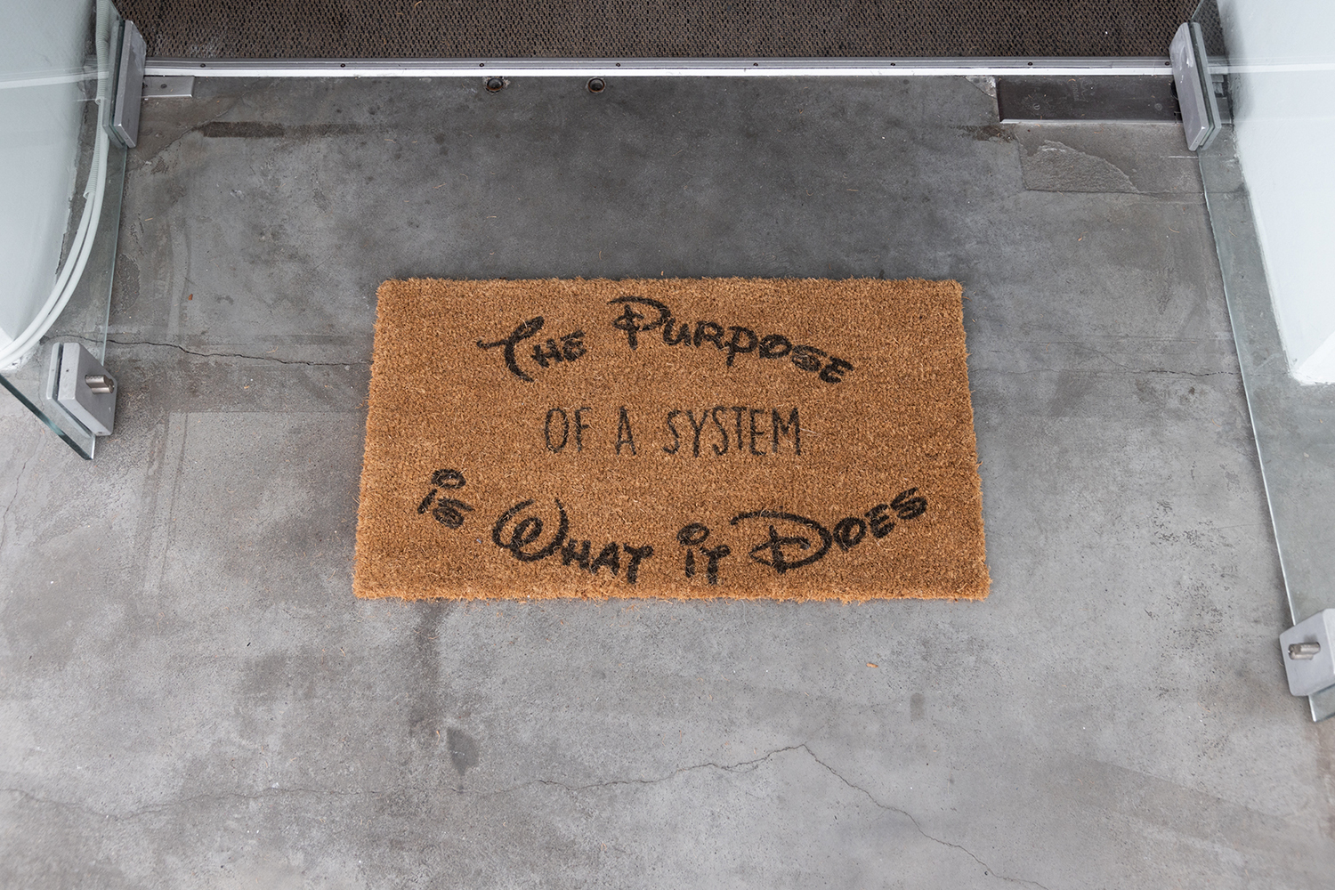 The Purpose of a System is What it Does. Floor mat .4 x .7 m 2025: Photo: Jane Treima