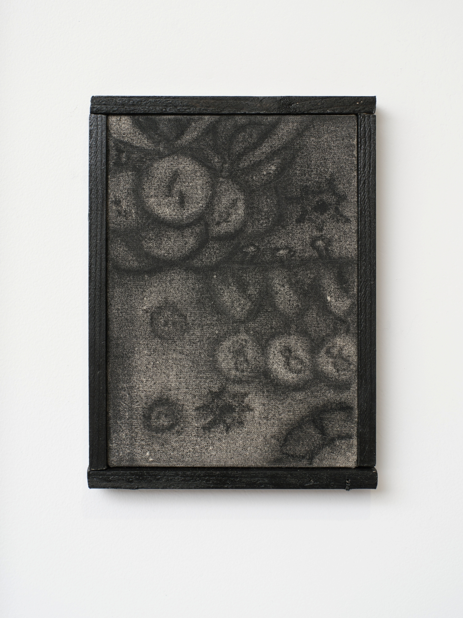 Agata Popik, “Not enough”, 2025, charcoal on cotton, wood stain, wooden frame, 24 x 17 cm