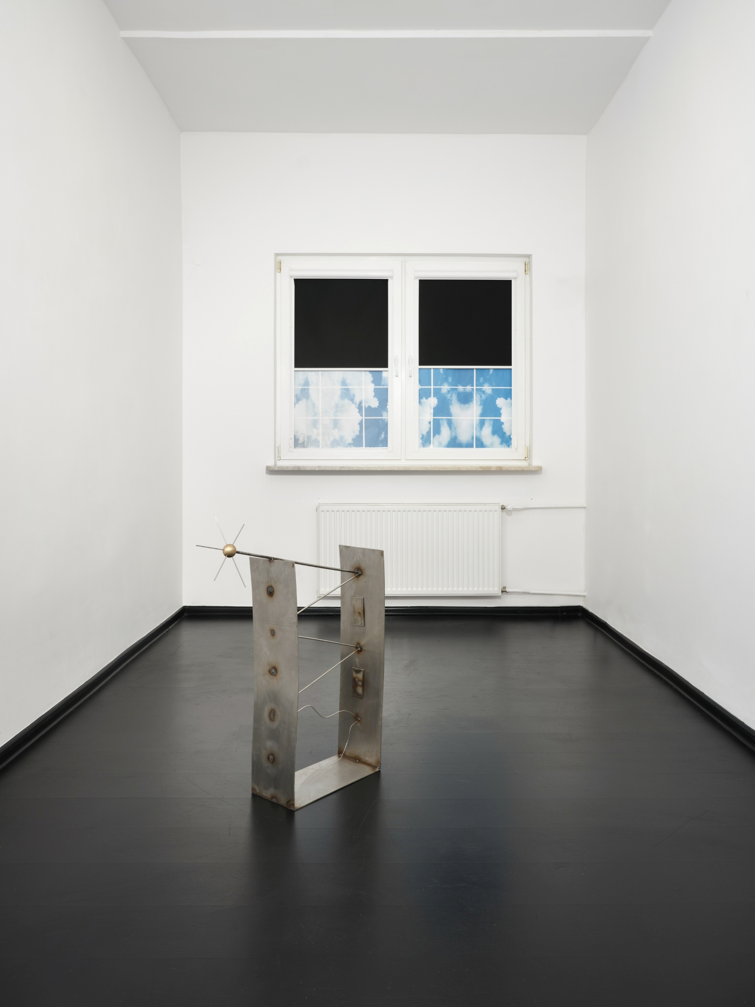 Kinga Dobosz, „A view of the regulation of the Minister of Infrastructure on the technical conditions that buildings and their location must meet”, 2025, stainless steel, 70 x 89 x 19 cm