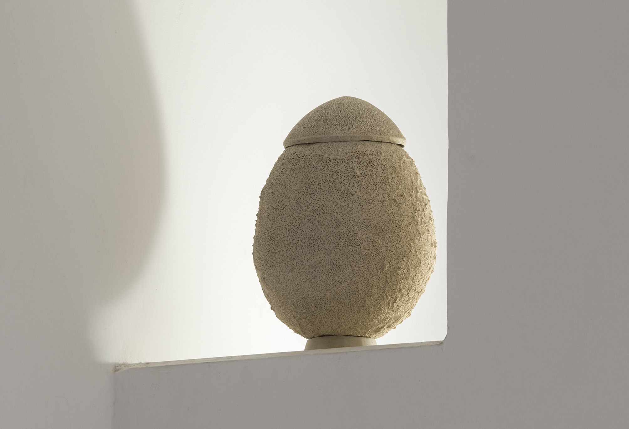 lare, Urna, 2025. Soil from Caffarella Park, sand from Ostia, recycled white clay, ashes collected from the firing of the clay objects displayed in the exhibition