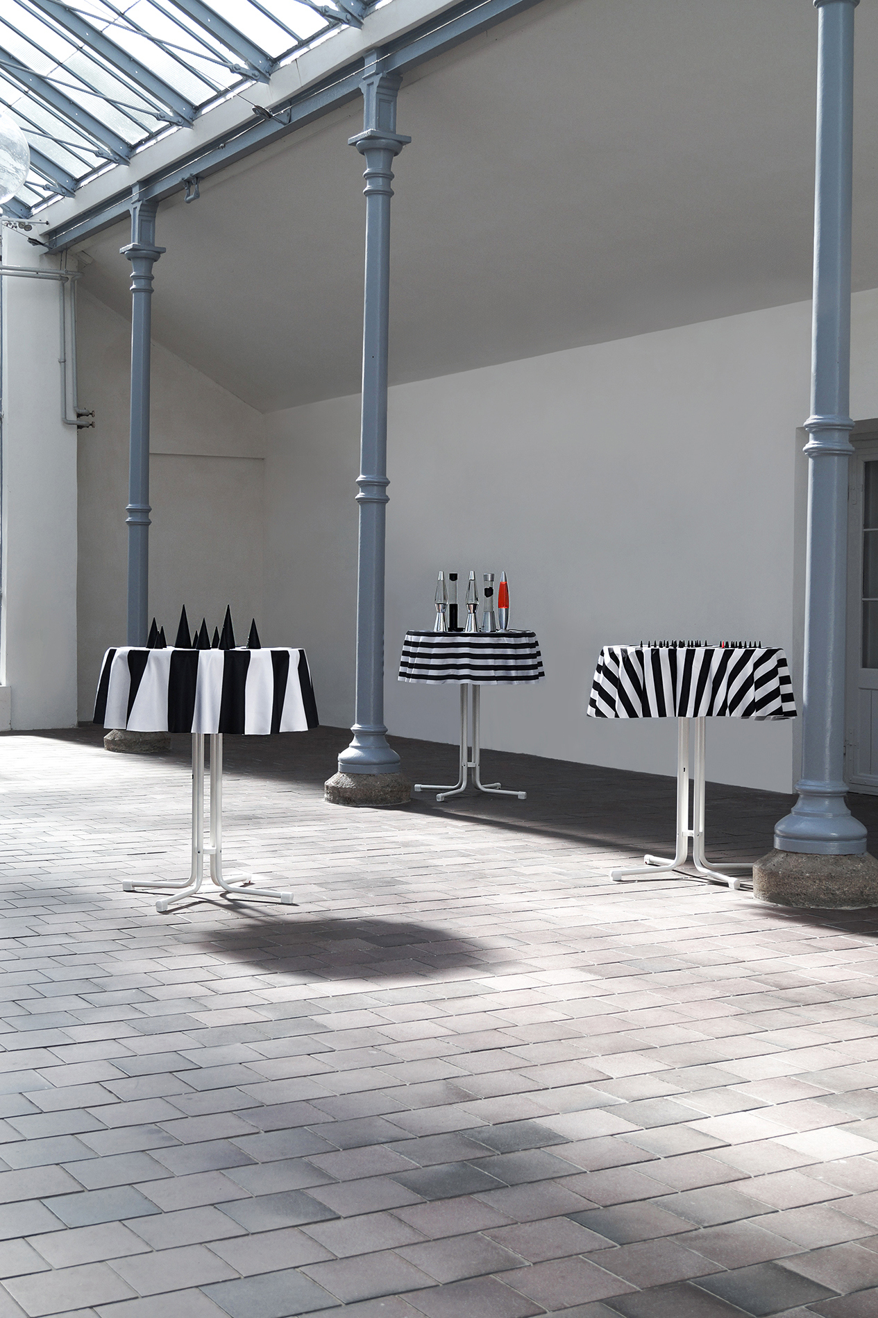 Georg Dahled: White Standing Tables I-III, 2025 Standing table, tablecloth, lava-lamps Between 112 and 160 cm high, â 70 cm