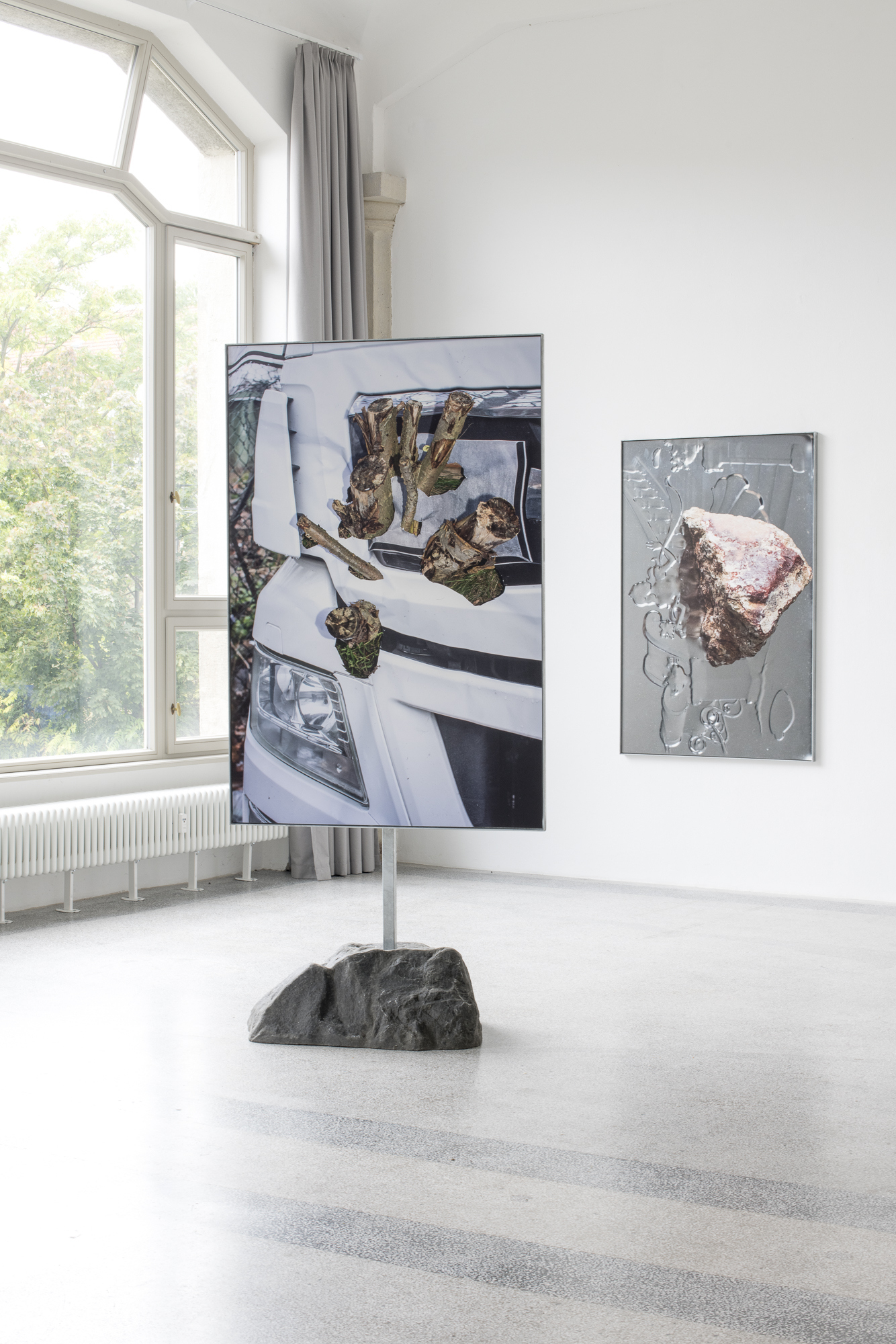 VergiĂź es, Magical Rage, 2024, 160 x 106 cm, fine art inkjet print, hot-dip galvanized steel frame, steel rod, artificial stone; Cinderella, Magical Rage, 2021, 160 x 106 cm, fine art inkjet print, hot-dip galvanized steel frame