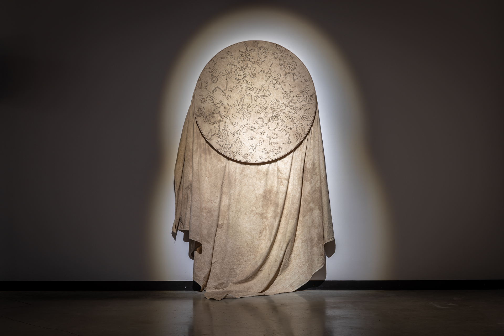 Karina Marusińska, "Peelings", 2025, installation, fabric dyed with natural pigments from potatoes hand painted with paint made from natural pigments and acacia resin, 235 x 225 cm, wooden hoop, diameter 100 cm