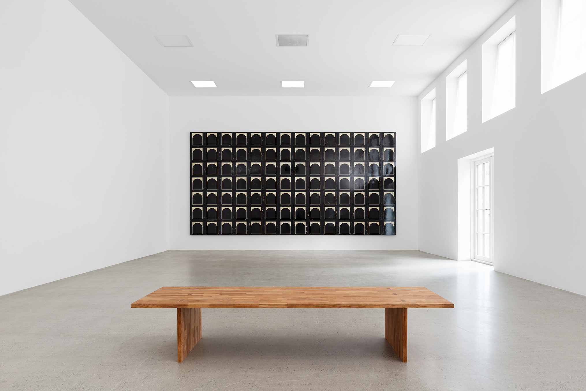 Sofiia Yesakova, Blind Spot 2.1.-2.100., each 40 × 40 × 5, total 280 × 560 × 5 cm, Acrylic, gesso, gelatine, varnish on wooden board, 2025