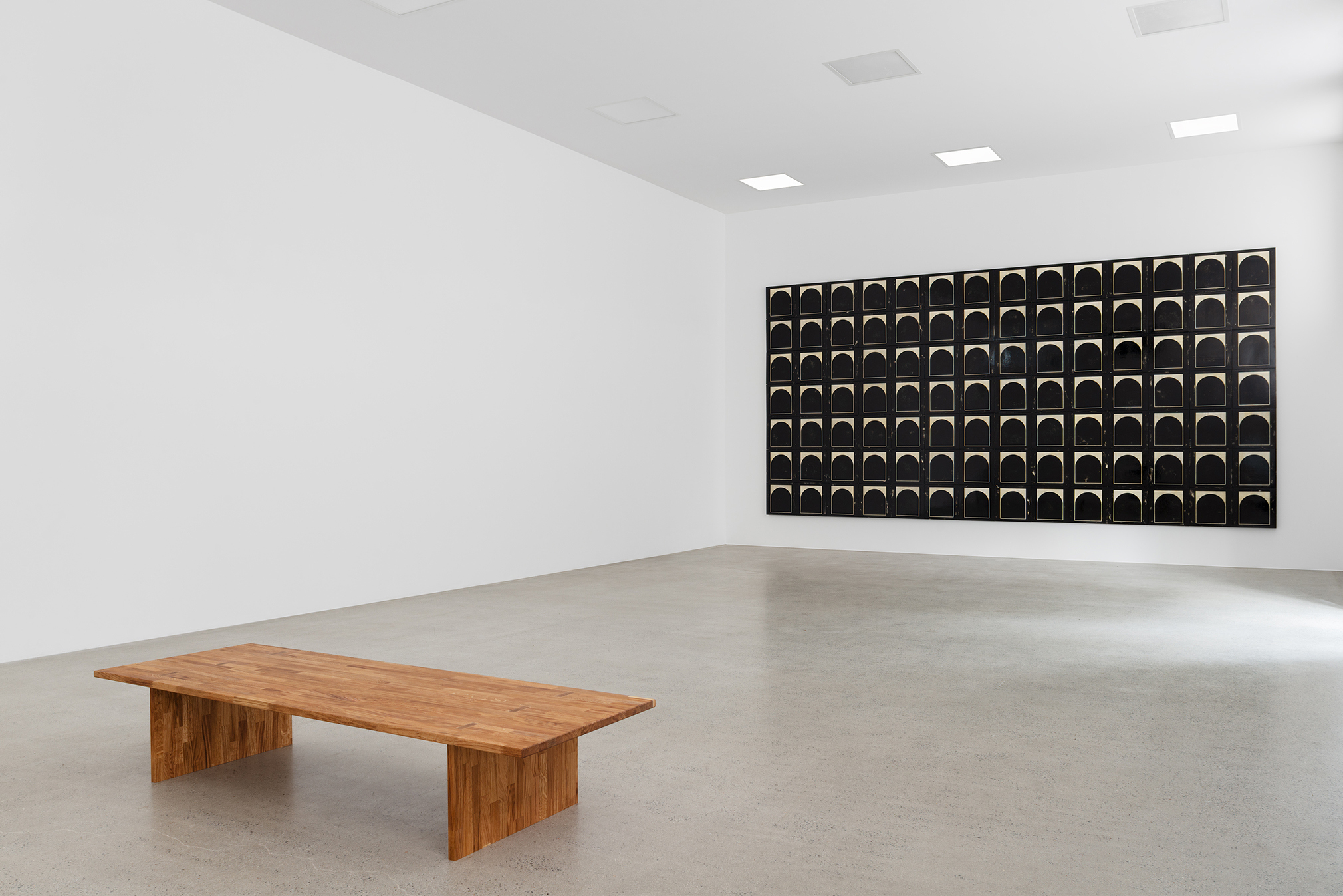 Sofiia Yesakova, Blind Spot 2.1.-2.100., each 40 × 40 × 5, total 280 × 560 × 5 cm, Acrylic, gesso, gelatine, varnish on wooden board, 2025