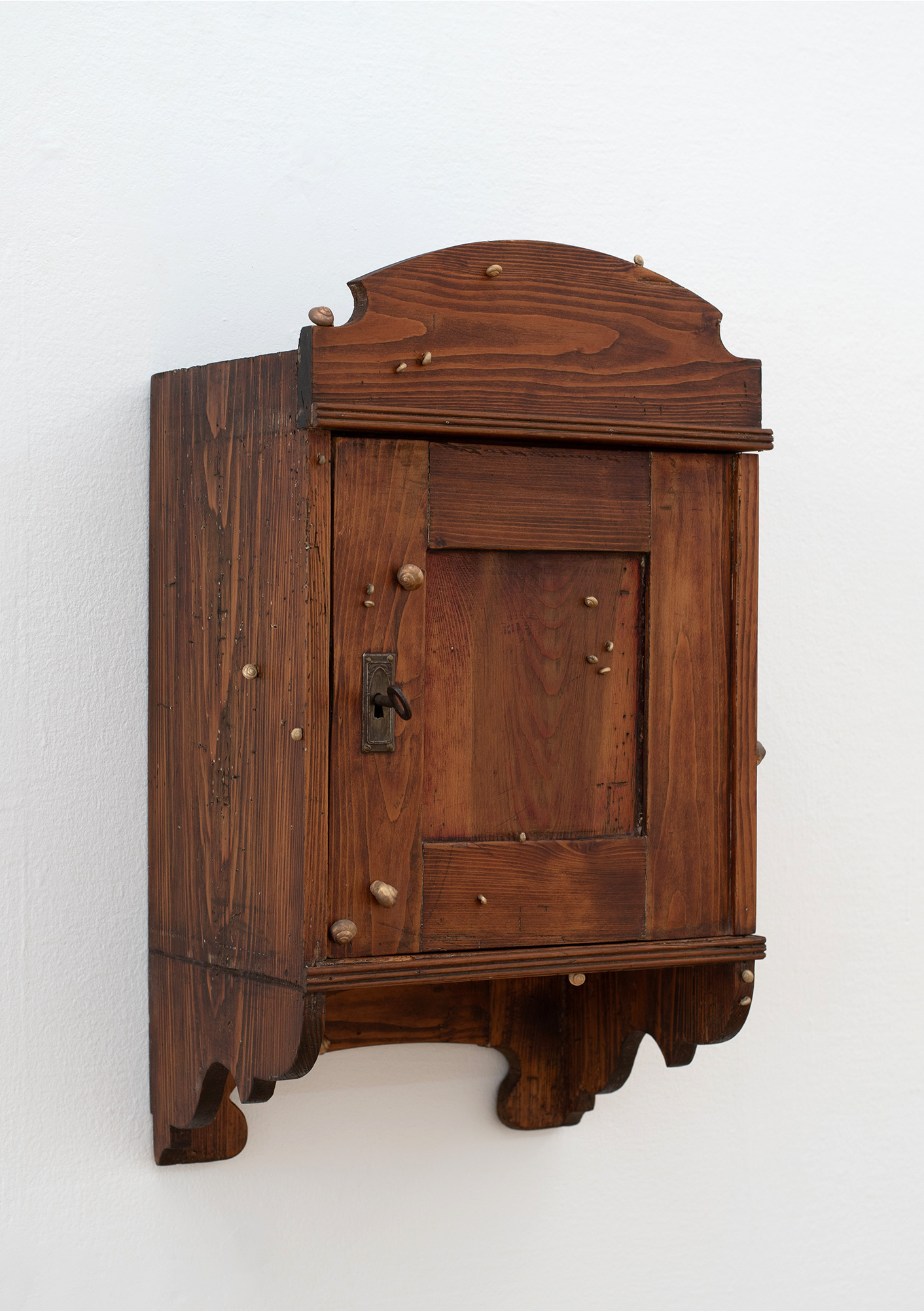 Lea Grebe, Cabinet I (snails), 2025, wood, bronze