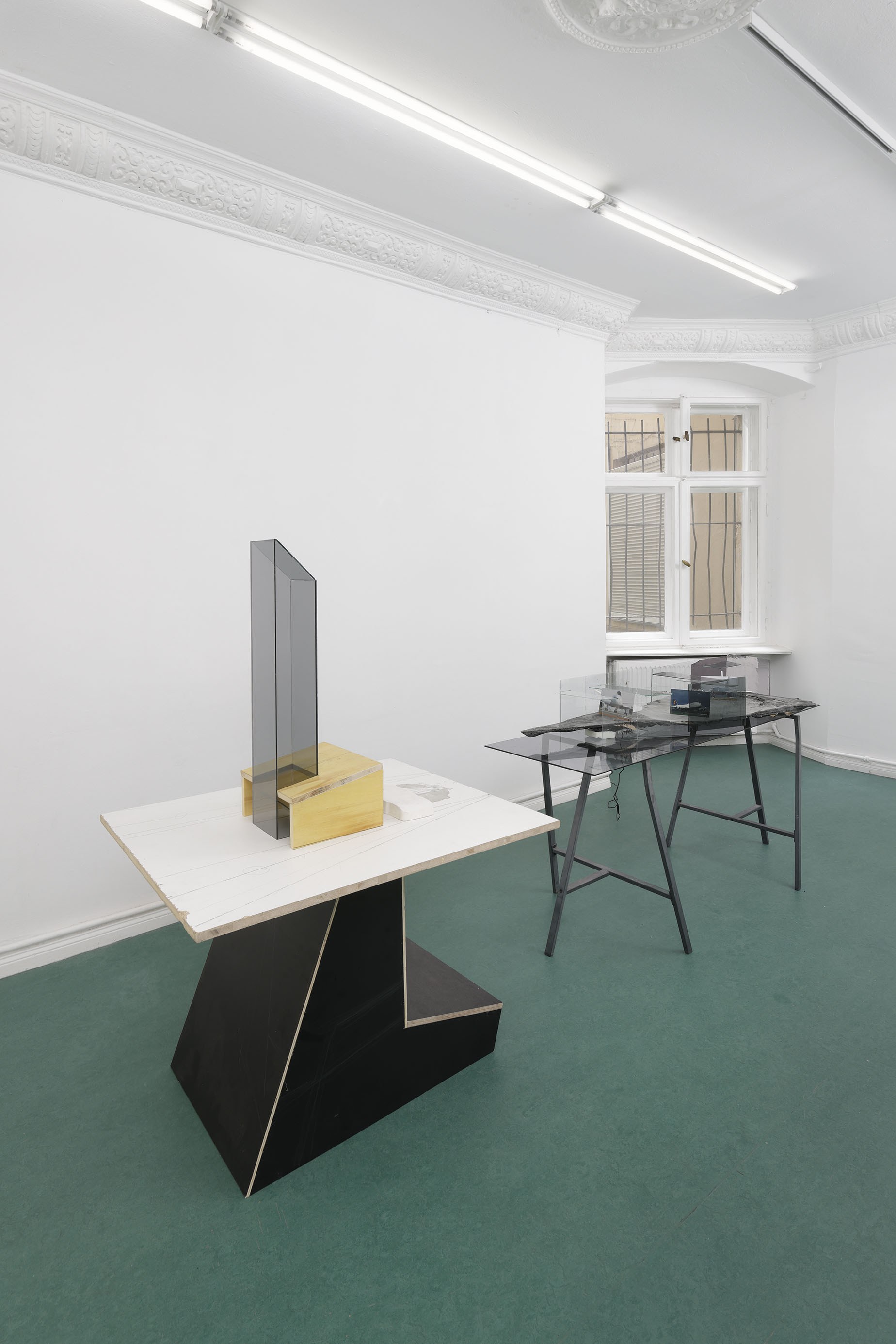 Ancient Airport, 2025, Runway: Postcards, cast foam, glass, imitation gold leaf, metal legs, motor, 148 x 80 x 92 cm; Control Tower: Laminated wood, MDF, found wood, glass, plaster, 148 x 80 x 92 cm