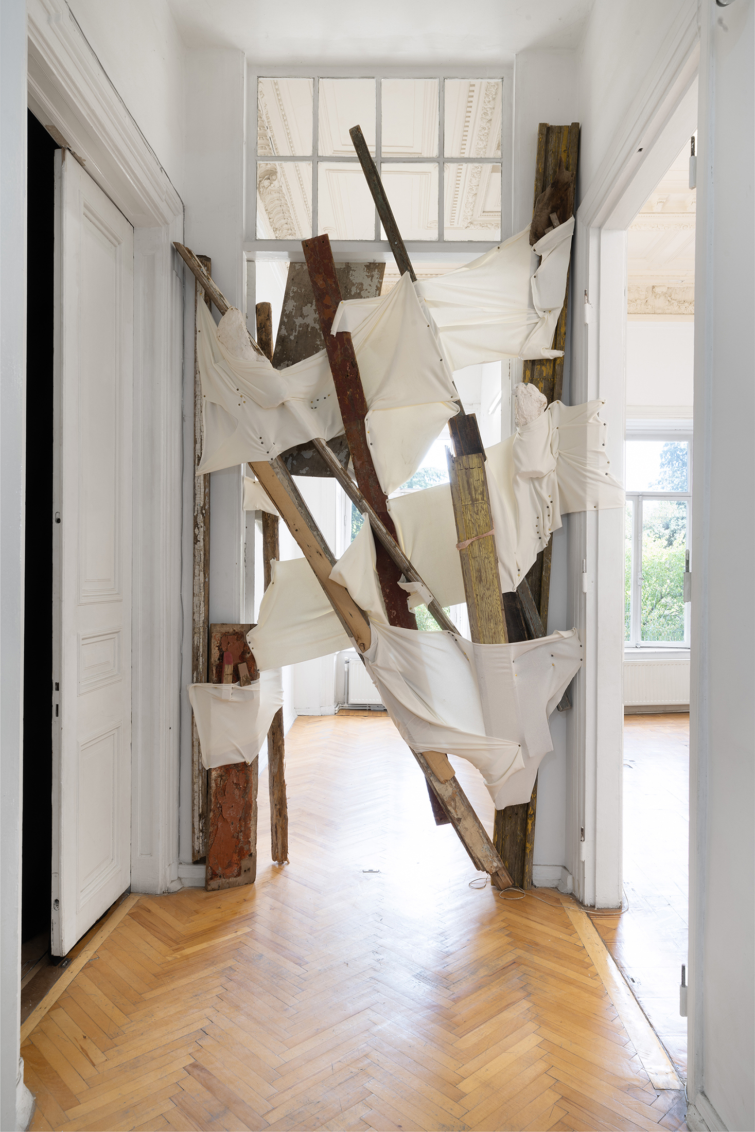Ana Gzirishvili, Untitled, 2025, Secondhand Wood Planks, Wood Fragments, Plaster, Sequin Beads, Upholstery Nails, Fabric, 335x220 cm