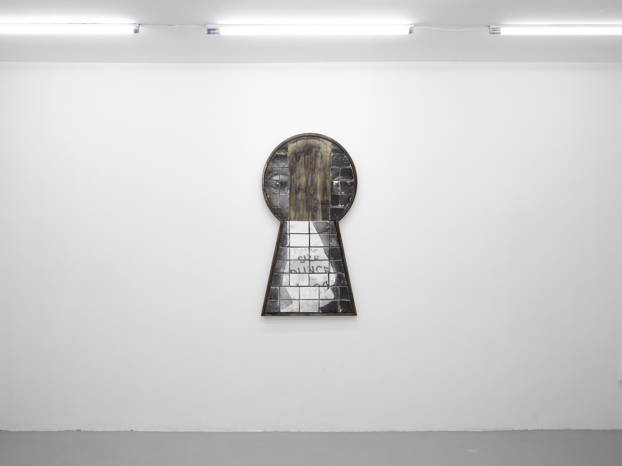 KING SIZE DUNCE - 126 x 68 x 5 cm - Laser transfer, strength & pliable stone modeling clay, oil pastel, matte varnish, chemically treated galvanized steel - photo by Fangyang