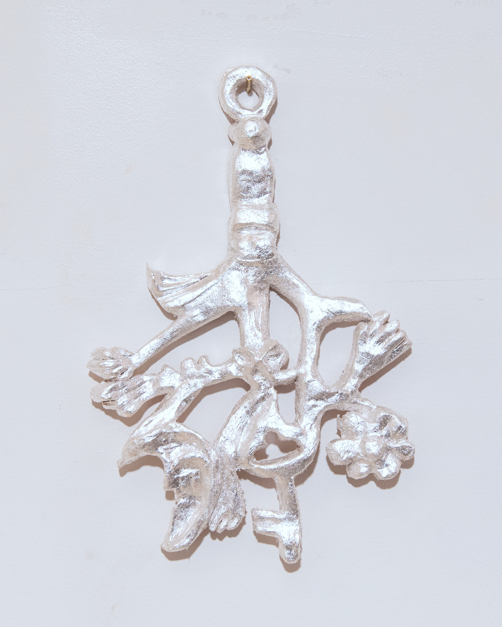 Anaïs Horn, Under Lunar Influence 1–7, 2024–2025.  Polyester clay, silver leaf, lacquer, approx. 20 × 12 cm each.