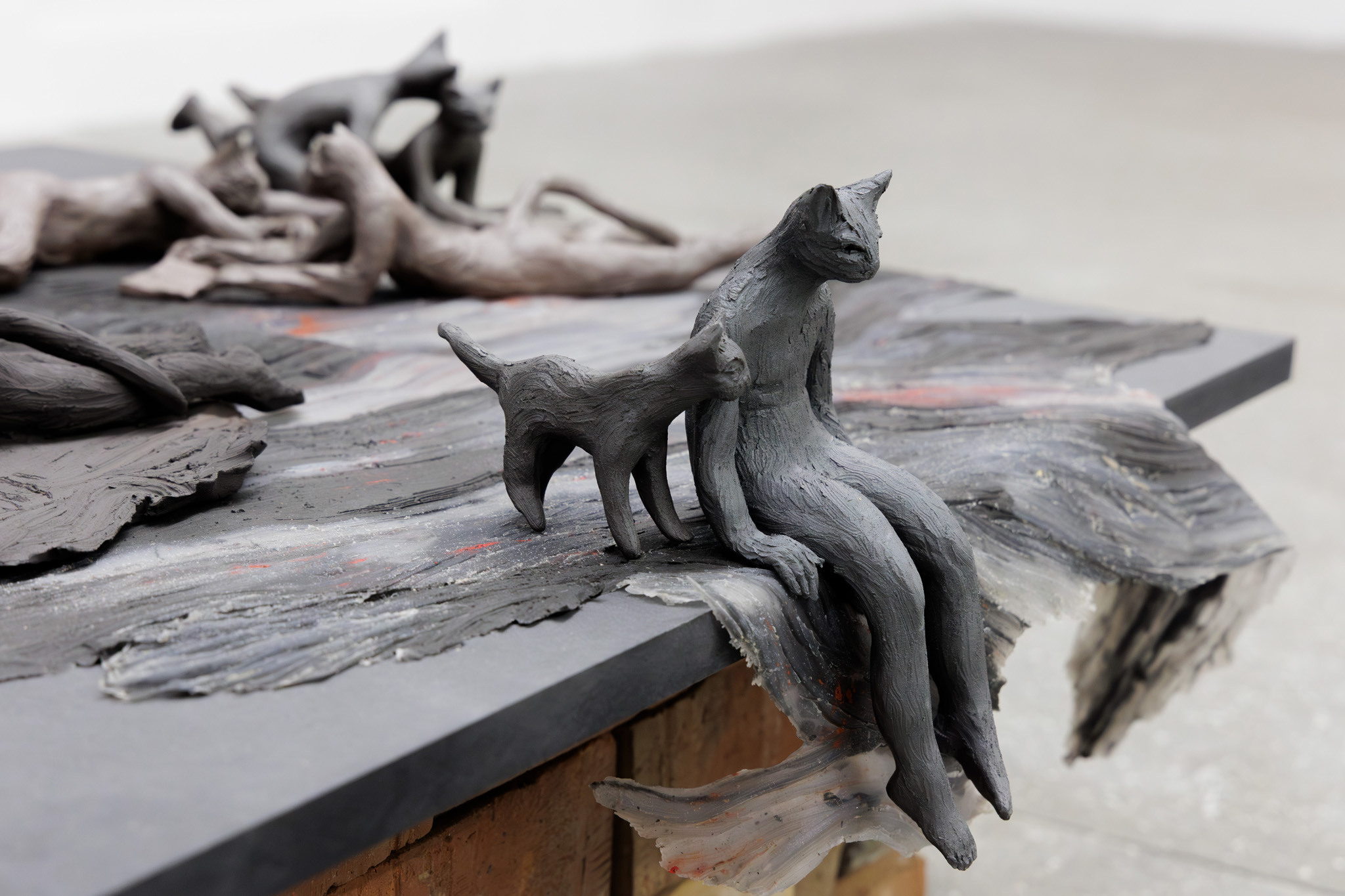 Anka Helfertova, To be in a time of war ( I keep changing my address but war never loses my scent) 2025, bricks, stone, MDF board, silicon, pigment, ceramic, 55 x 120 x 77 cm and 40 x 30 x 30 cm