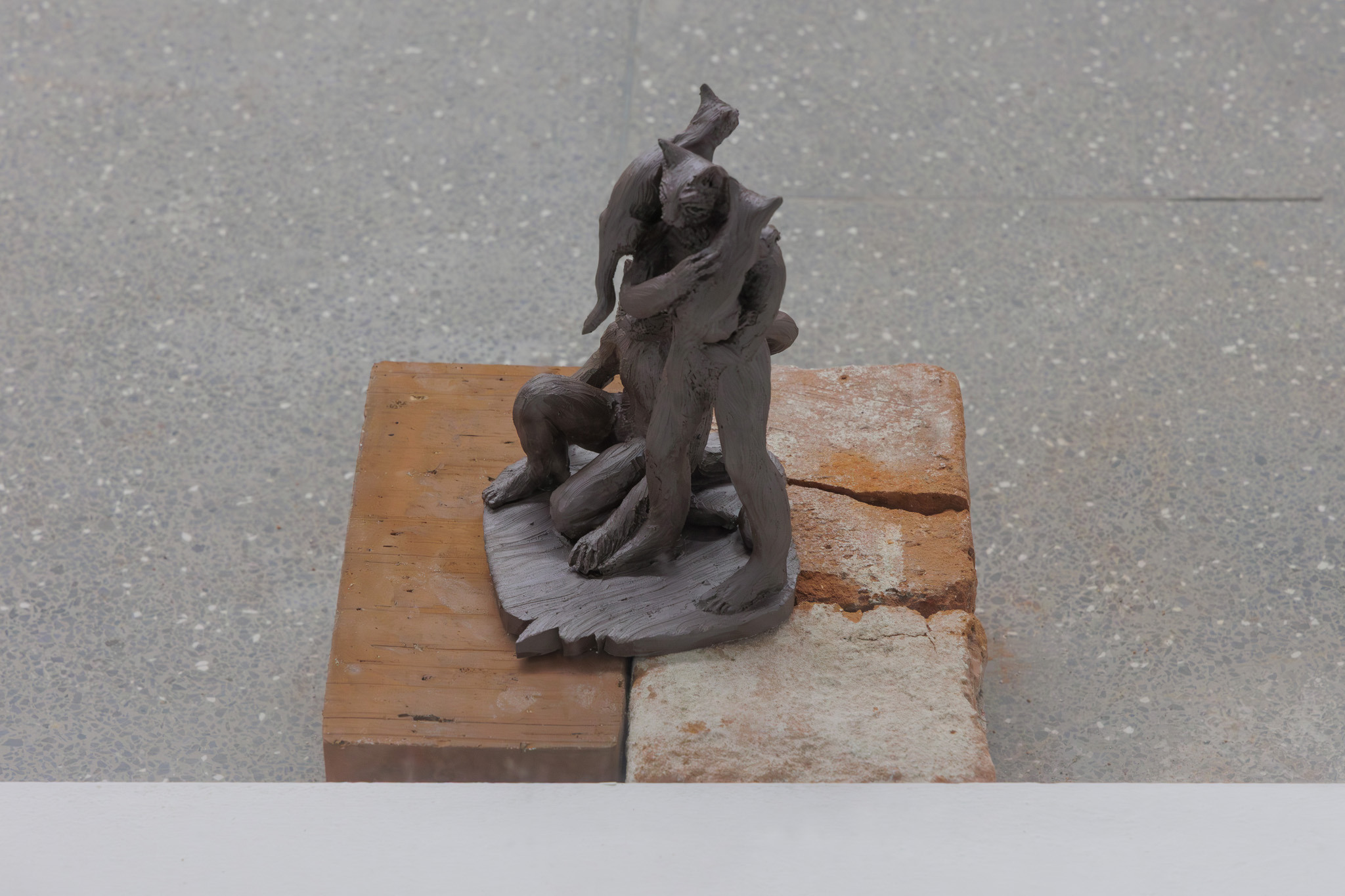 Anka Helfertova, To be in a time of war ( I keep changing my address but war never loses my scent) 2025, bricks, stone, MDF board, silicon, pigment, ceramic, 55 x 120 x 77 cm and 40 x 30 x 30 cm