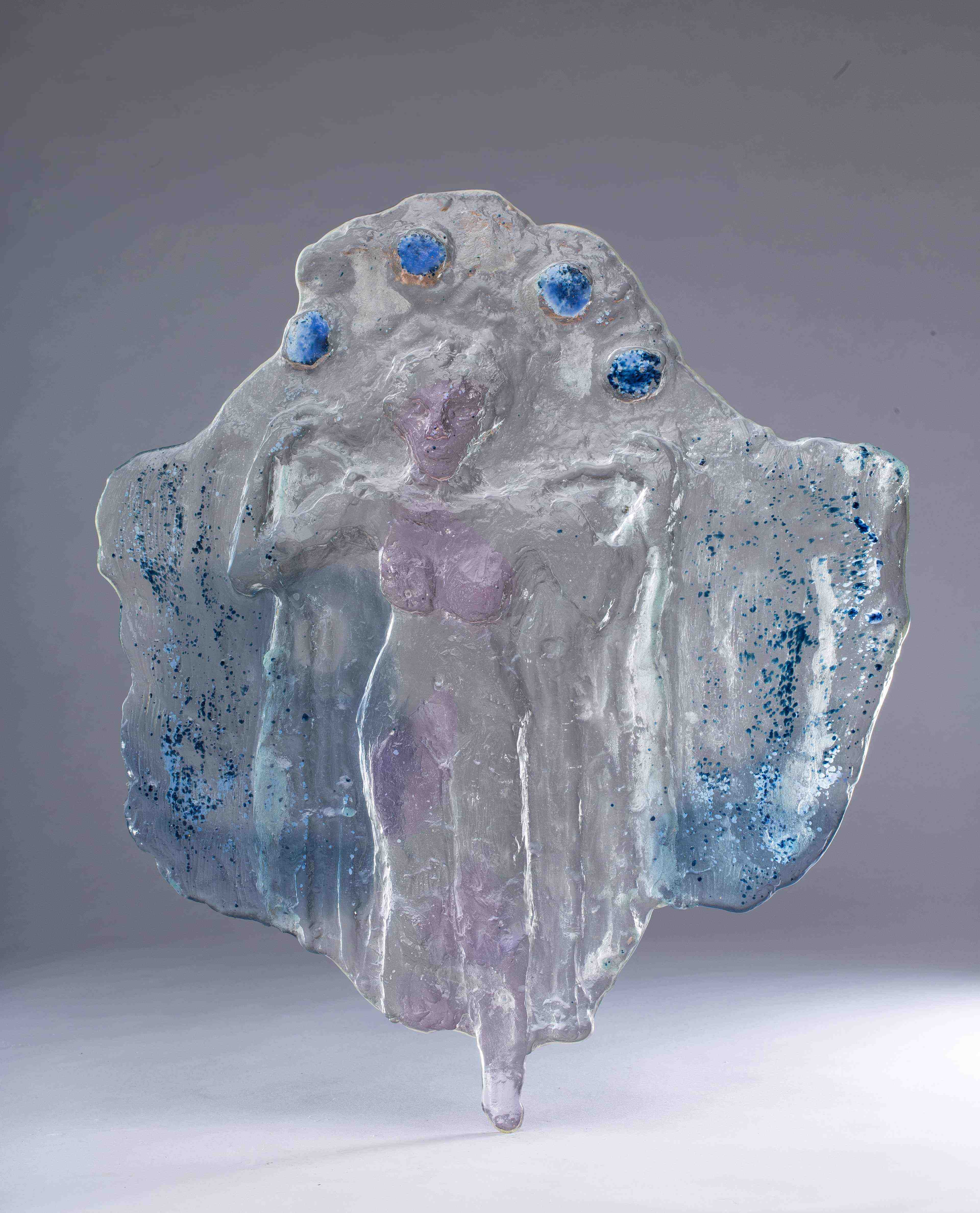 woman holding a veil, kiln casted glass