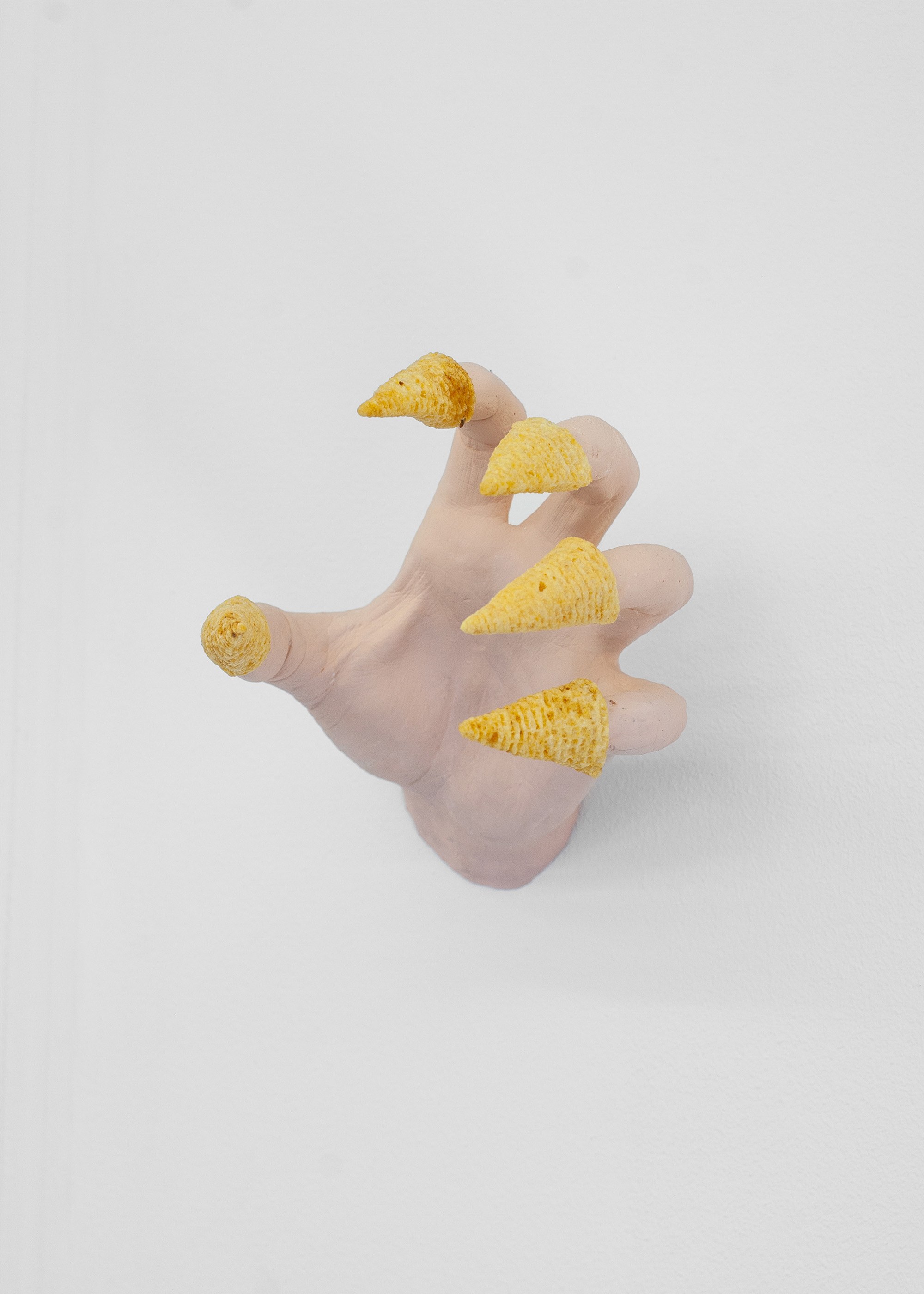 Misha Gudwin, Сrispy horror, 2025, gypsum, acrylic, chips Lay’s 3D’s Bugles, 30 х 50 х 30 cm 