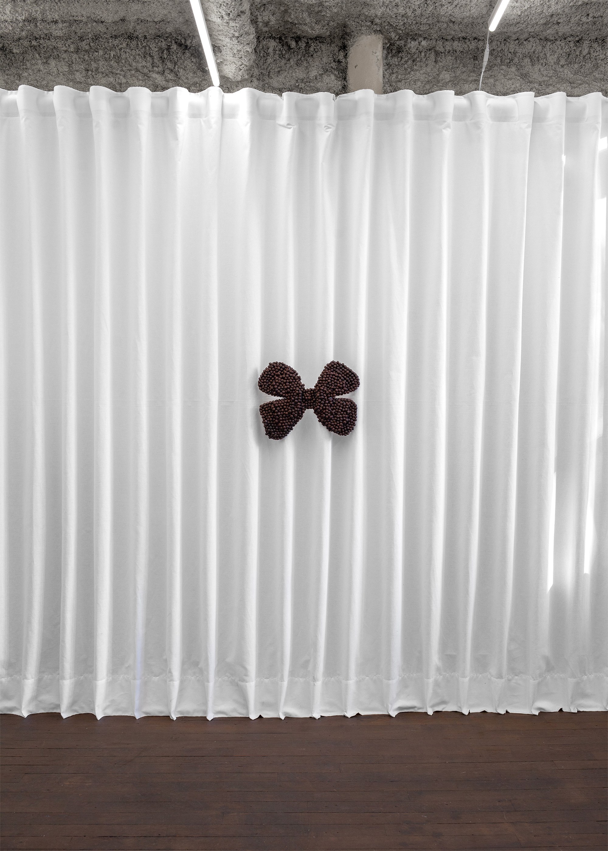 Iuliia Skromnaya, "Choco Bow", 2025, Object, Nesquik, 26 х 40 х 3,5 cm 