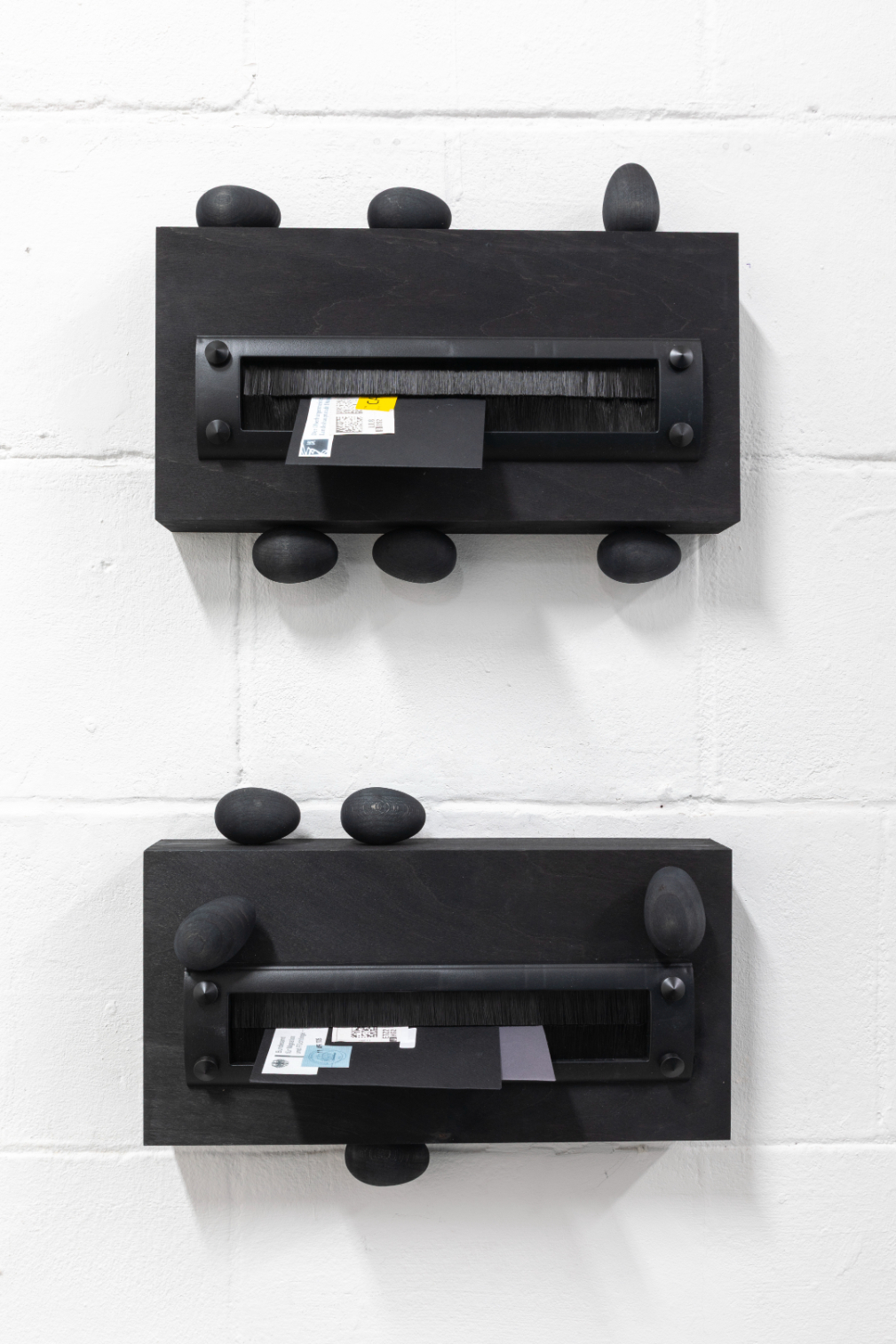 Yeşim Akdeniz, Walking on Eggshells #8, (2025). Wood, metal, letters, 40x25cm. / Yeşim Akdeniz, Walking on Eggshells #6, (2025). Wood, metal, letters, 40x25cm.