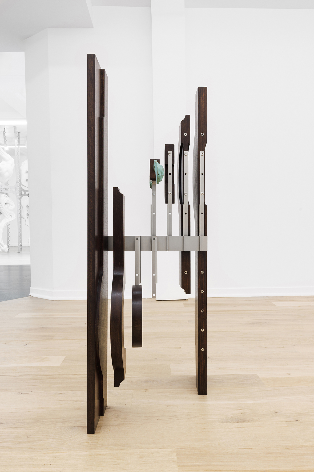 Iconic Domain (s), 2025, patinated bronze, wood, stainless steel