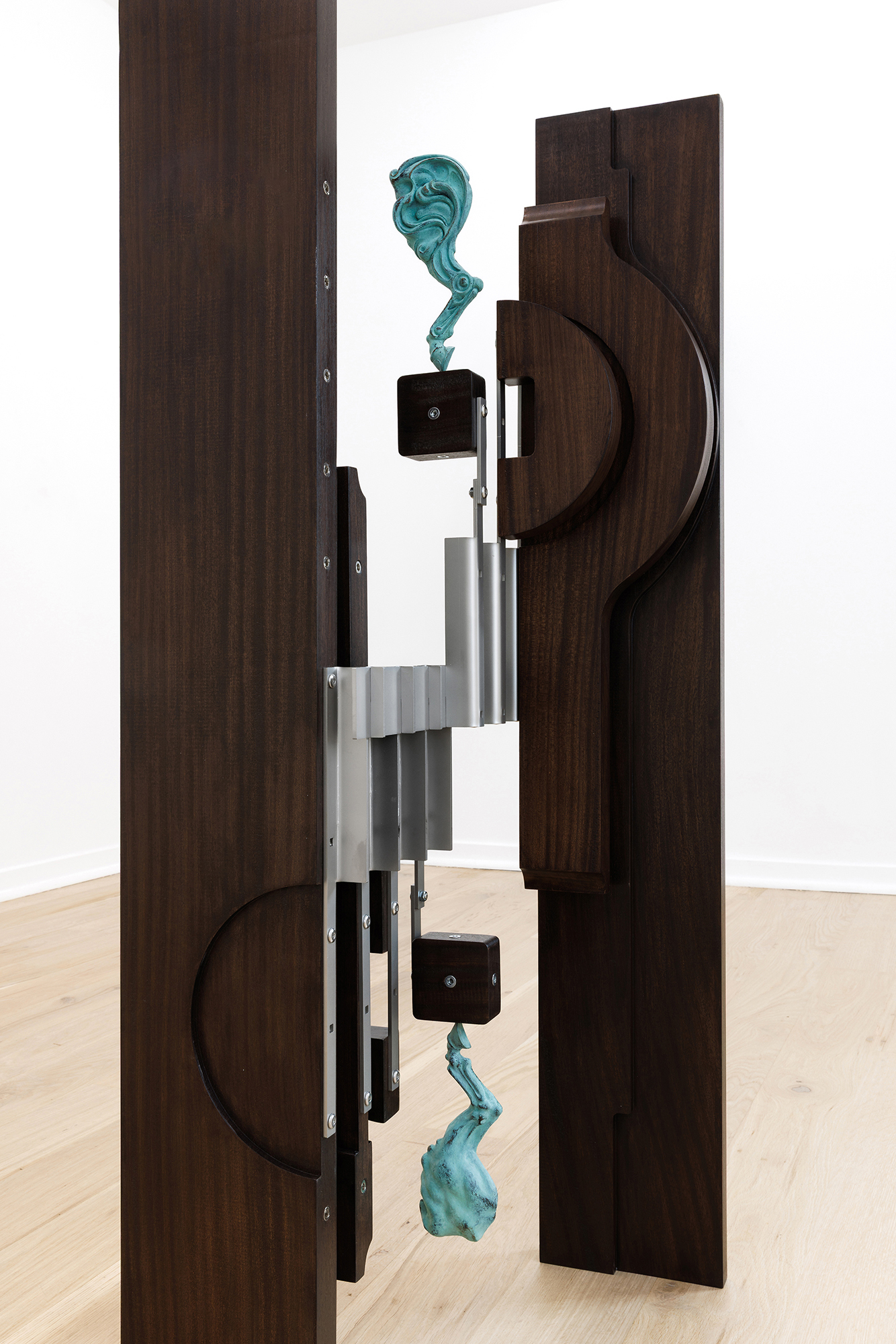 Iconic Domain (e), 2025, patinated bronze, wood, stainless steel