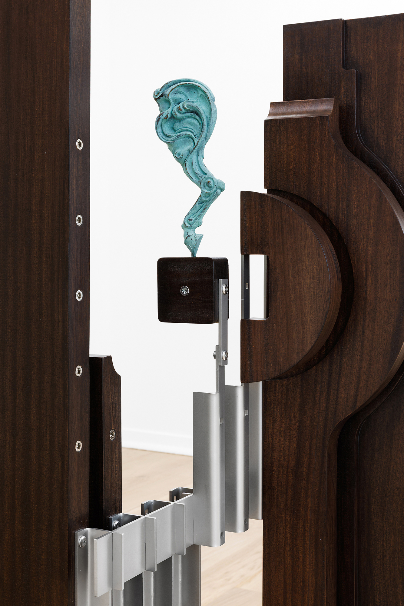 Iconic Domain (e), 2025, patinated bronze, wood, stainless steel