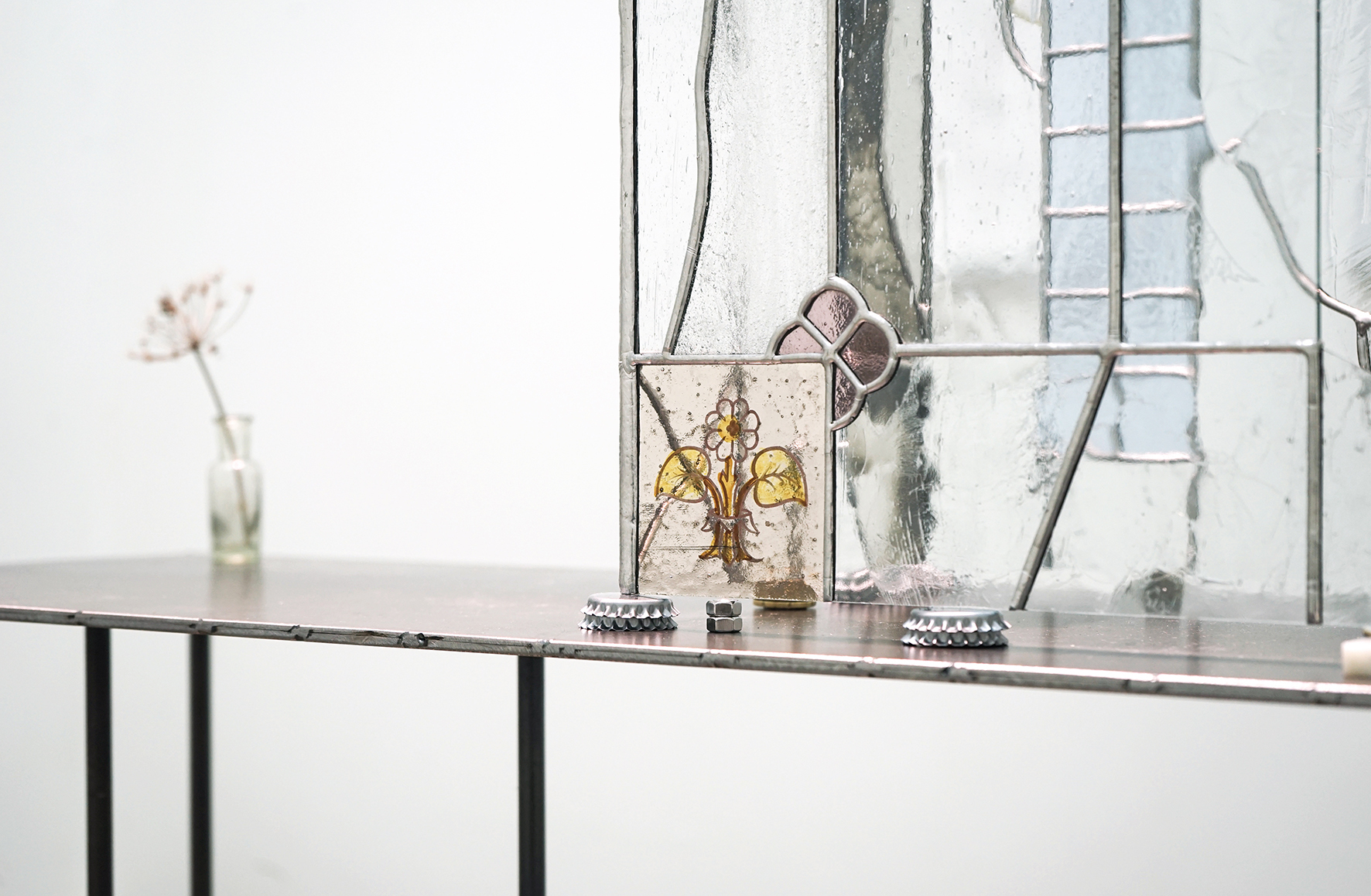 Anna Mari Liivrand. Fading Voltage, Cow Parsnip and Lily of the Valley. 60 x 42 cm,  aluminum frame, graphite and colored pencil on cotton paper, museum glass 2025. Photo Anna Mari Liivrand