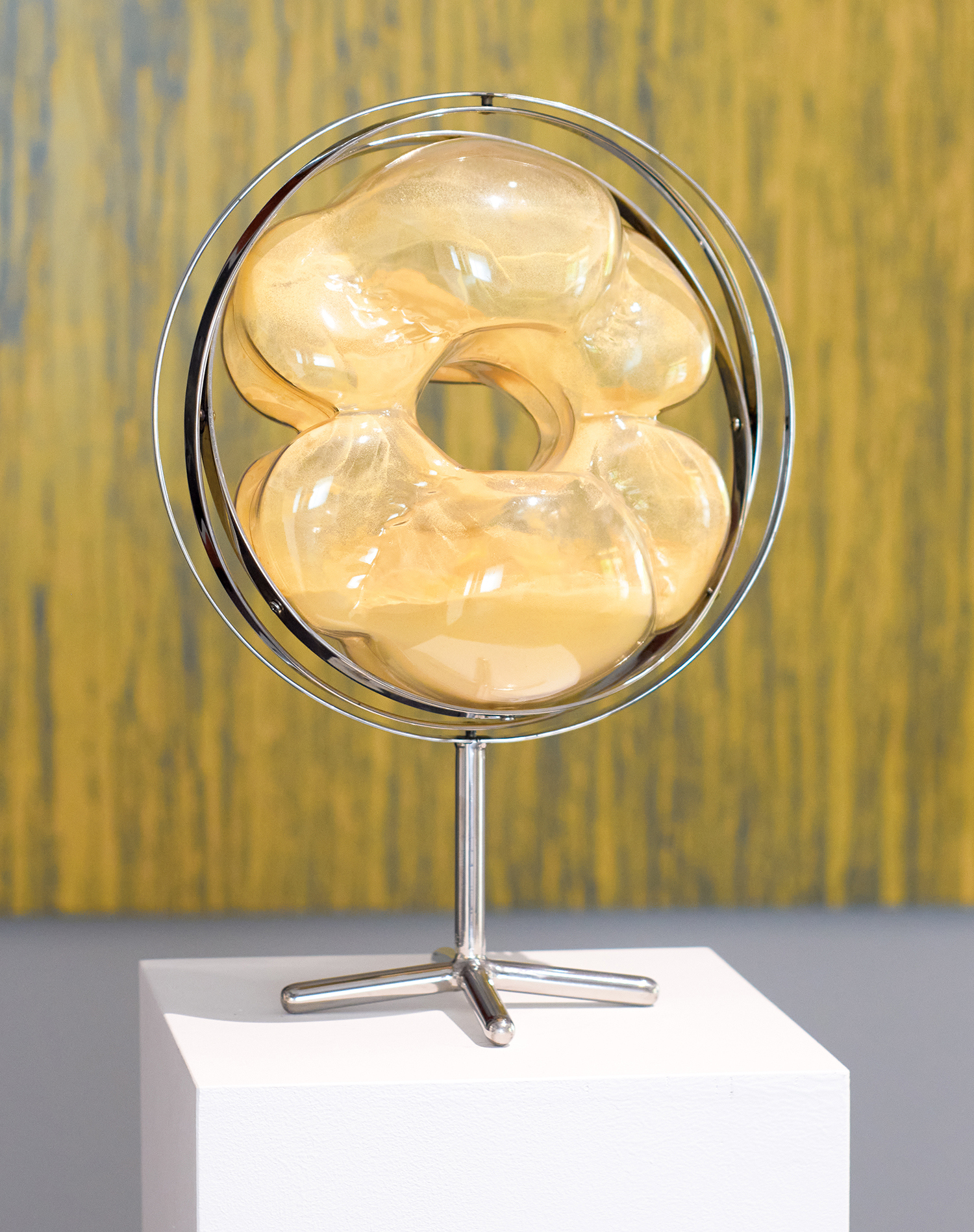 Gyropollen I 2024 - raw pine pollen, resin, steel - 42 x 29 x 29 cm.