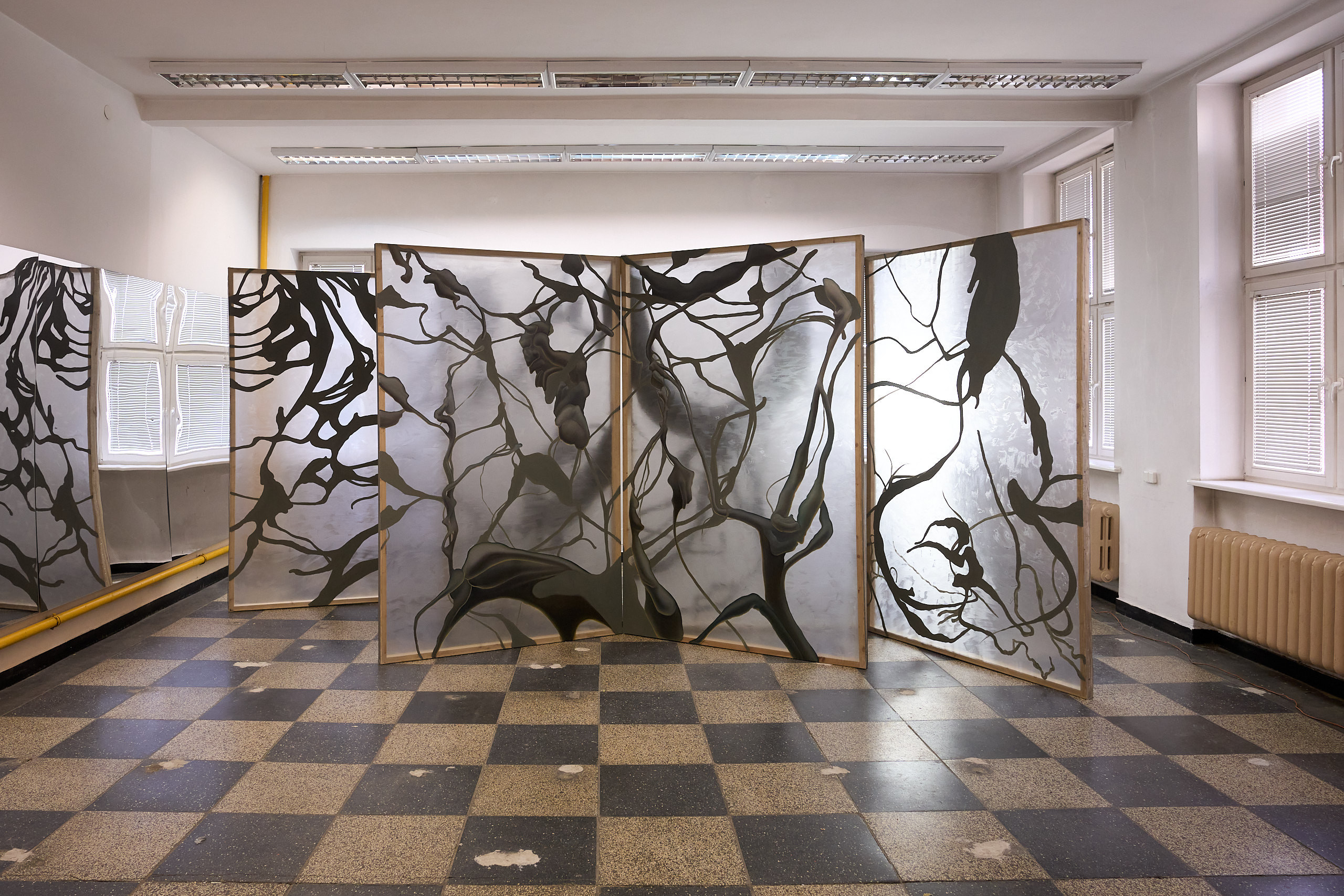 Julia Królikowska, Zanurzenie, 2025, acrylic and oil on organza, three panels.  Photograph: Marcin Sokalski. Courtesy of Julia Królikowska. 