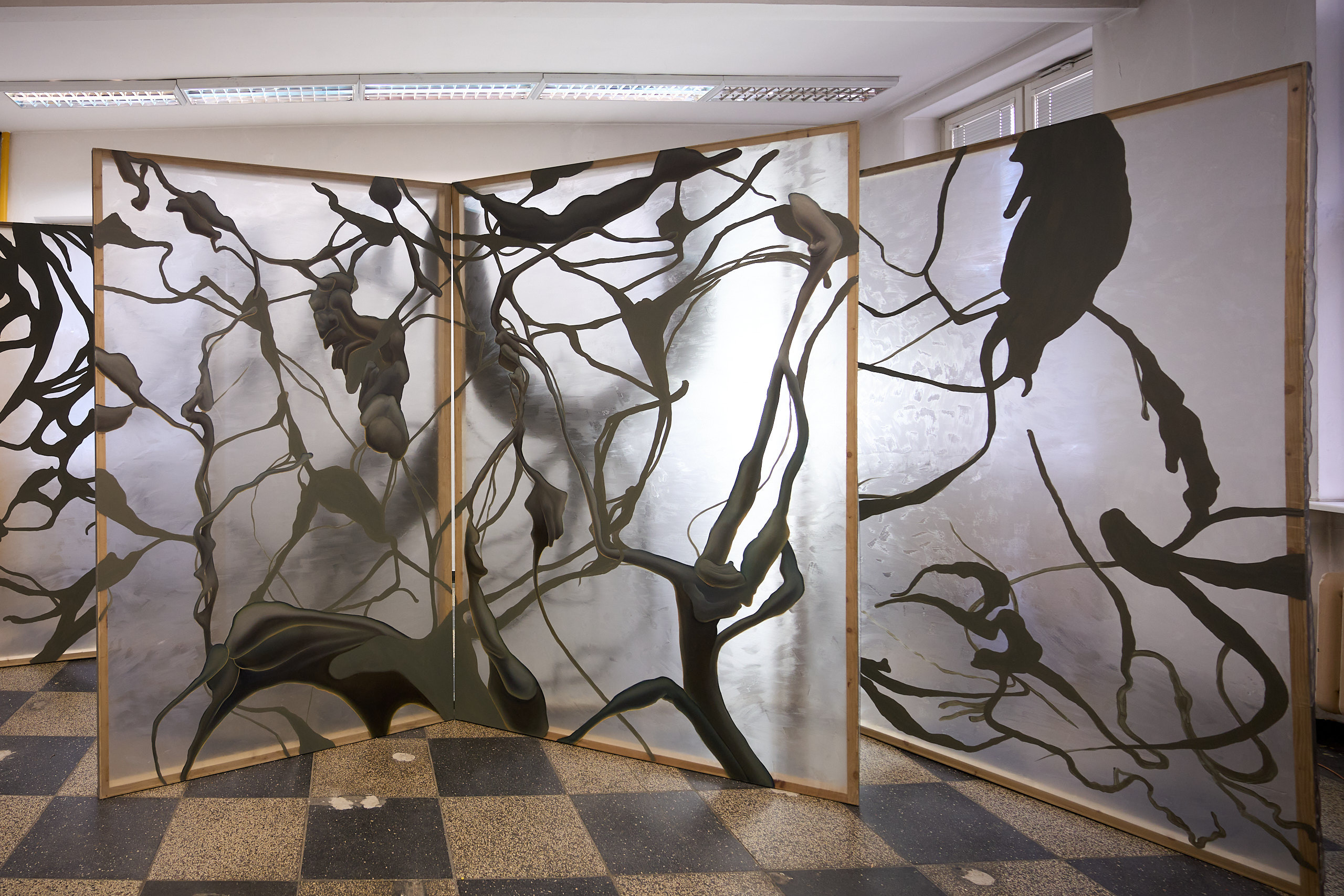 Julia Królikowska, Zanurzenie, 2025, acrylic and oil on organza, three panels.  Photograph: Marcin Sokalski. Courtesy of Julia Królikowska. 