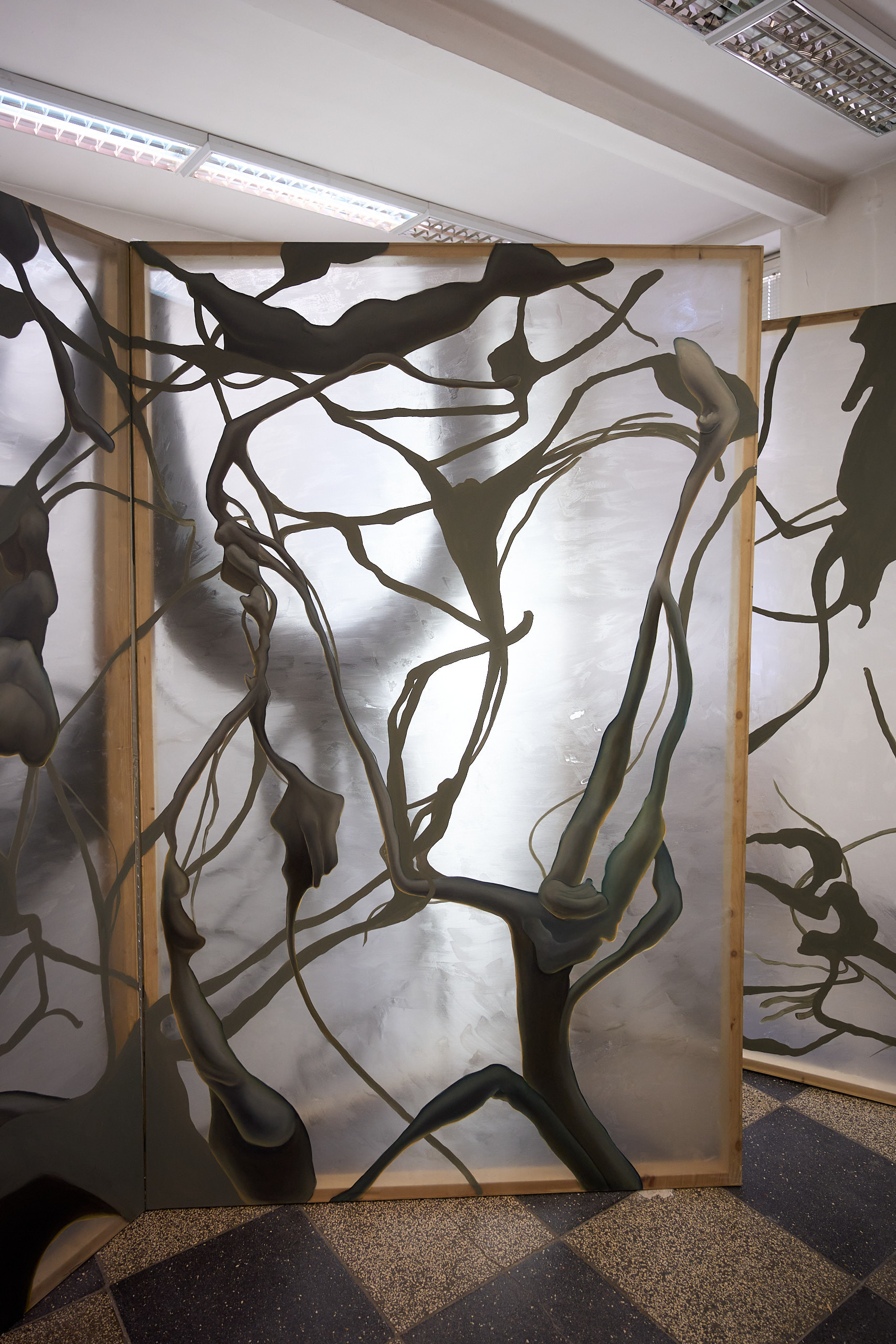 Julia Królikowska, Zanurzenie, 2025, acrylic and oil on organza, three panels.  Photograph: Marcin Sokalski. Courtesy of Julia Królikowska. 